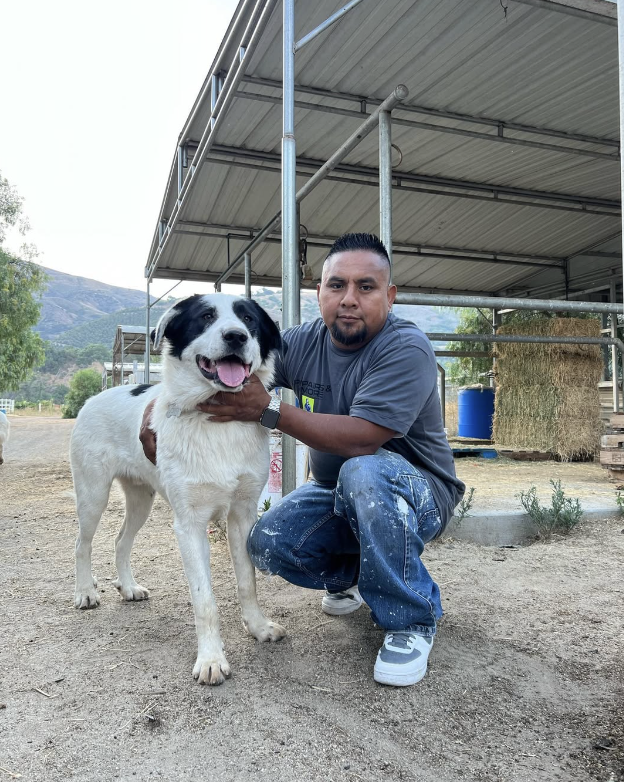Mauro Ramos, owner of Repairs y More, with one of his five dogs. With over 20 years of experience, he provides reliable home remodeling and repair services across Los Angeles County.