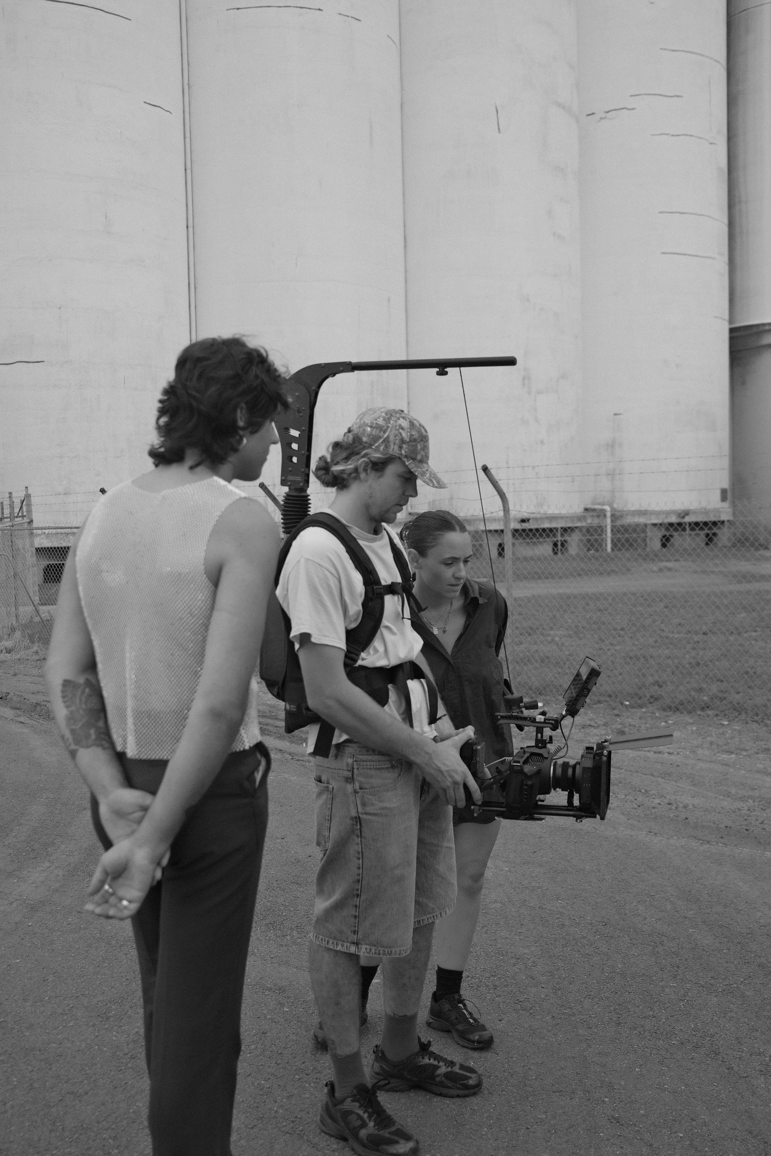 Industrial Drive crew reviewing footage on location during a commercial production shoot.