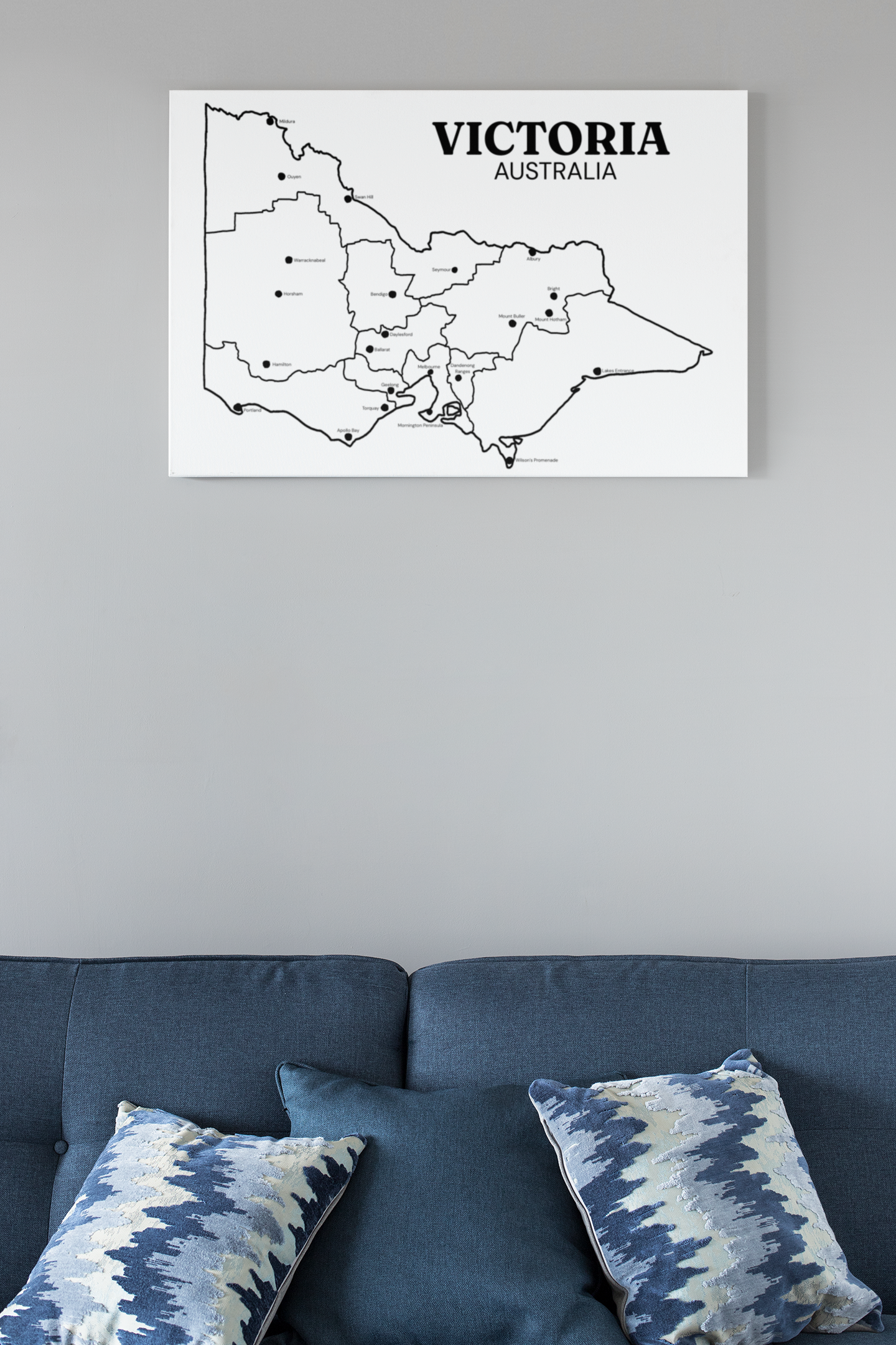 mockup-of-a-canvas-hanging-on-the-wall-of-a-neat-living-room-25868.png