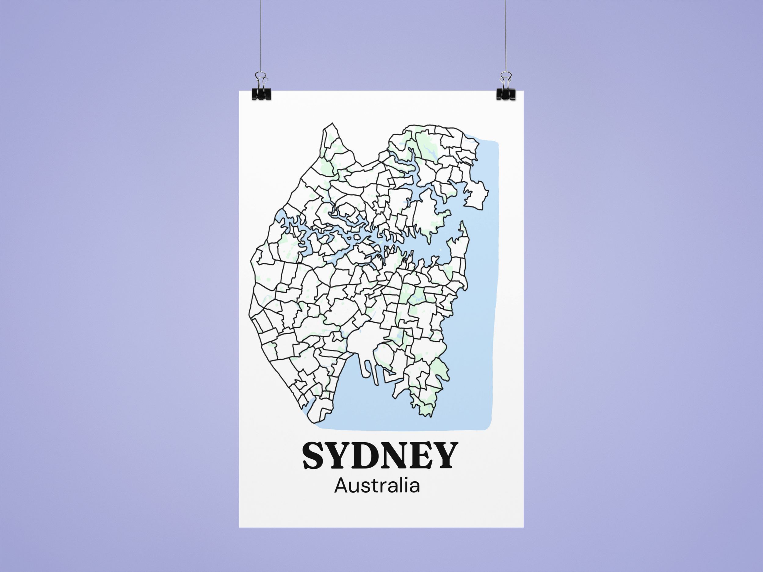 Bare Sydney suburb map print, unframed, hanging from bulldog clips against a purple background