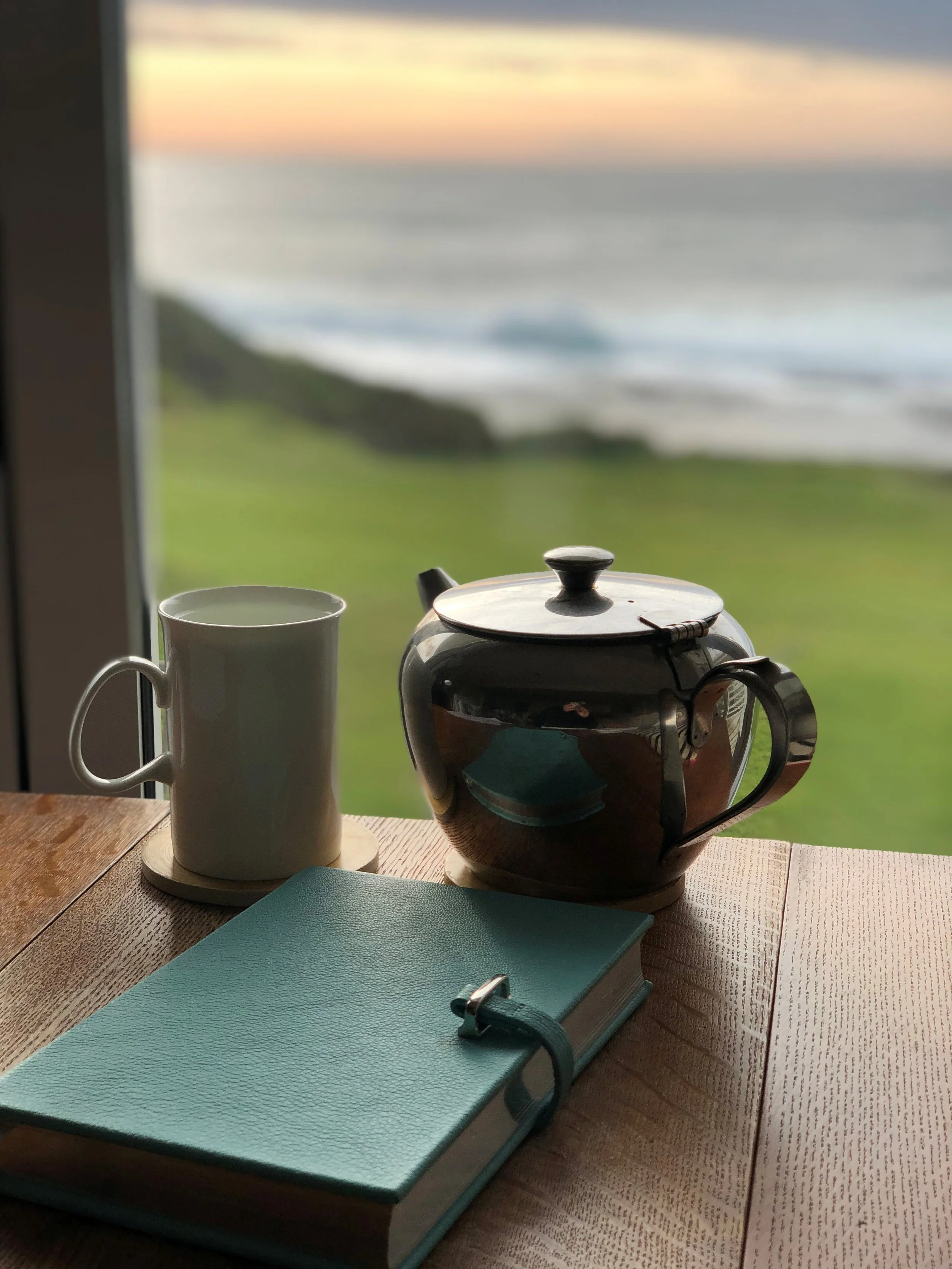 A cup of tea and a journal