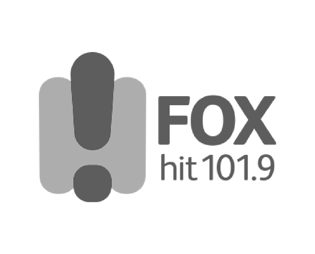 Warning sign with an exclamation mark next to the text 'FOX 106'