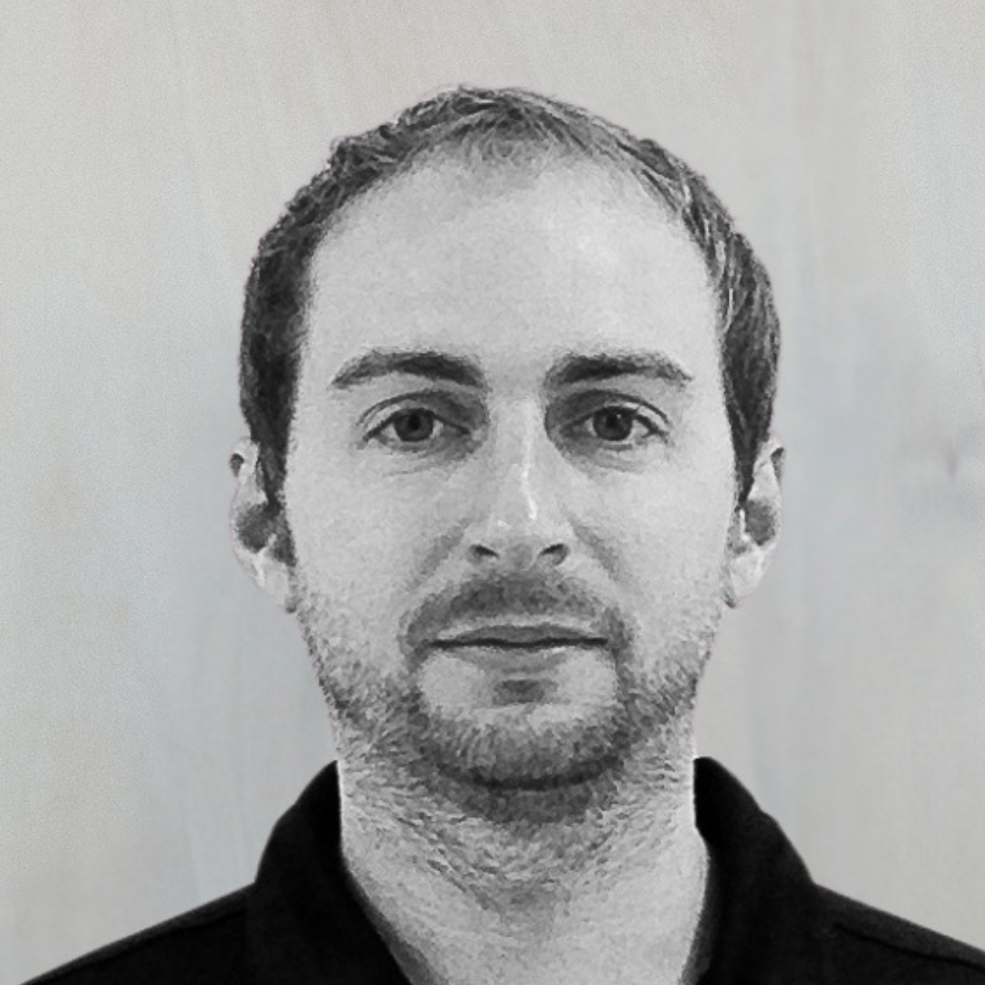 Black and white photo of MARTIN GIBSON. Meta, Google & SEO specialist at BRANDID MEDIA GROUP