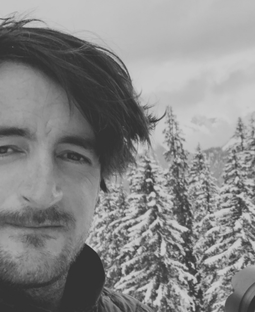Black and white photo of TOM HANNAM. Cinematographer at BRANDID MEDIA GROUP