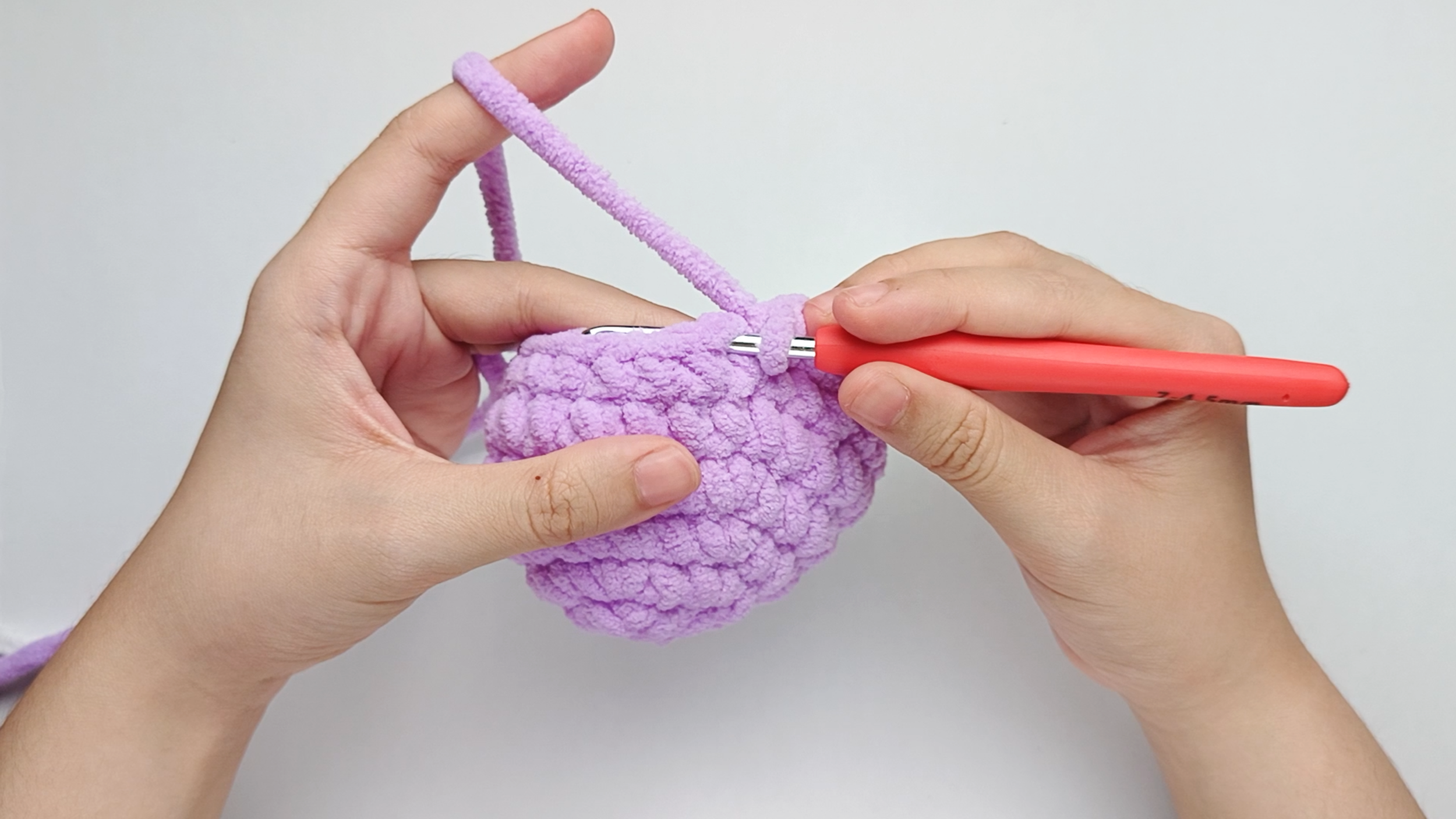 Hook back in: Insert your hook into that marked stitch to begin Round 8. Remove the stitch marker so the stitch is easier to work into.