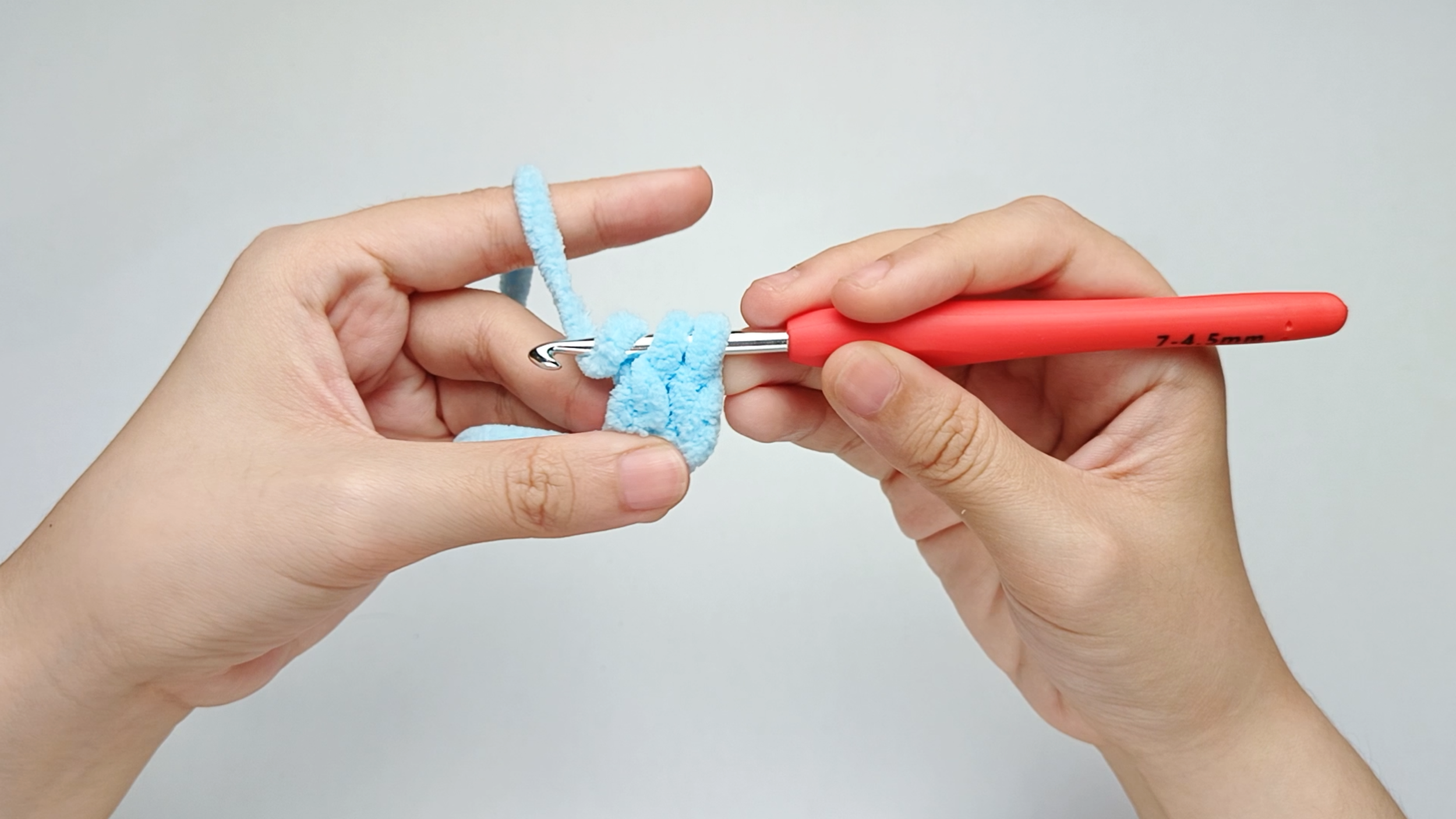 Yarn over again: Wrap the yarn over your hook one more time.