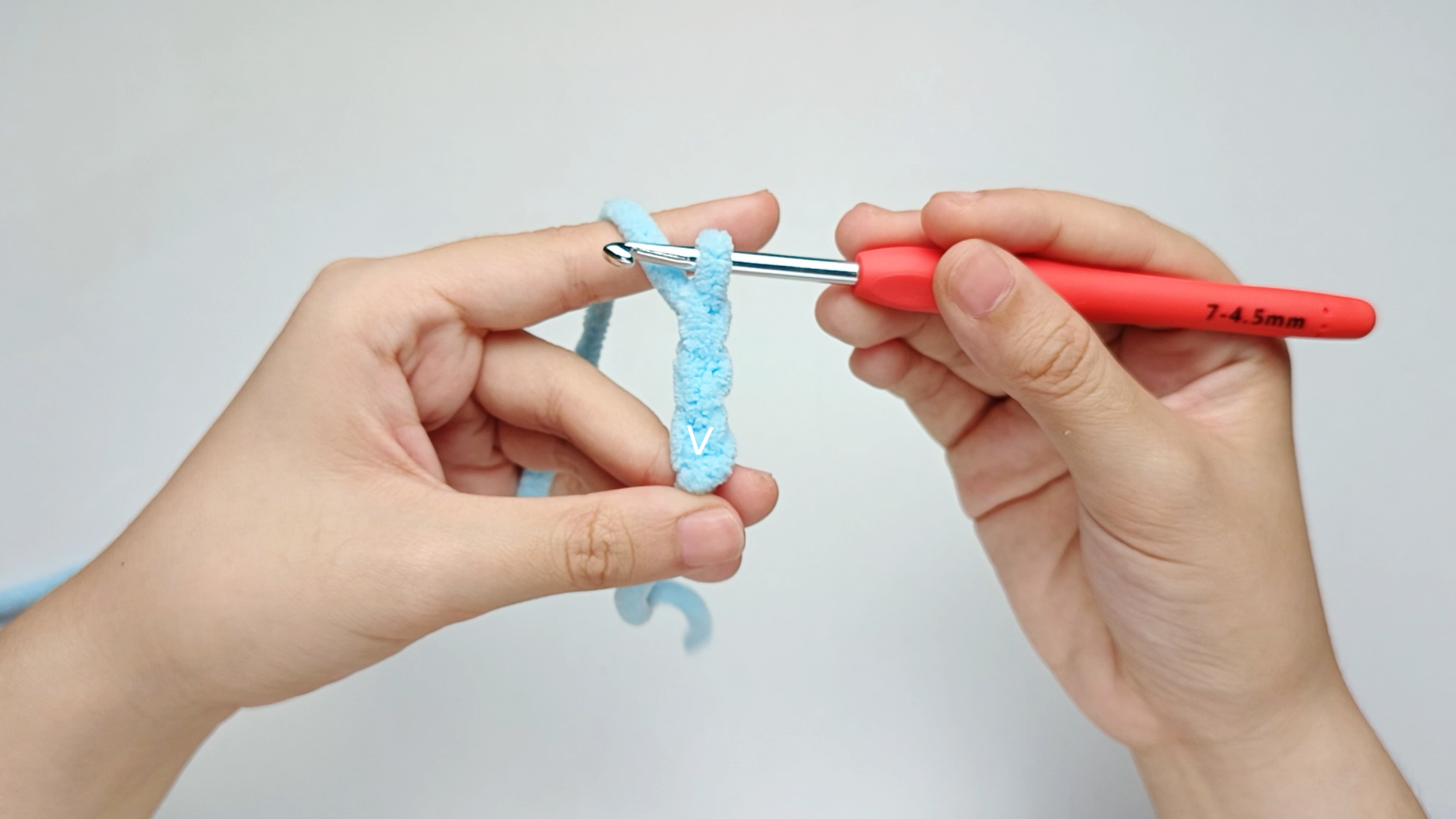 Find your anchor stitch: Your anchor stitch is the very first chain you made - the one furthest from your hook (the 3rd chain from the hook).