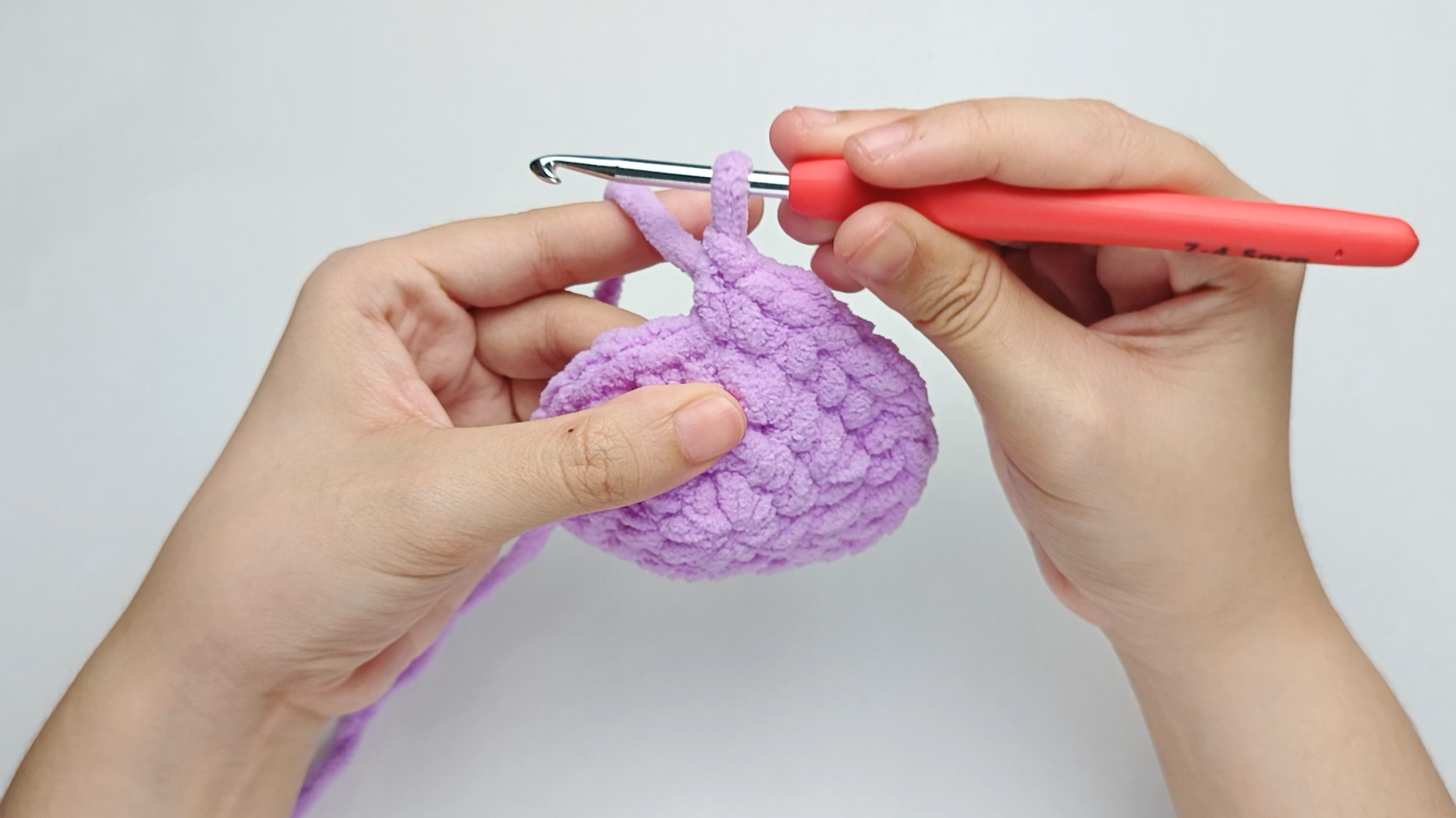 Make 1 single crochet (sc) first: Yarn over, pull through, yarn over again, and pull through both loops.