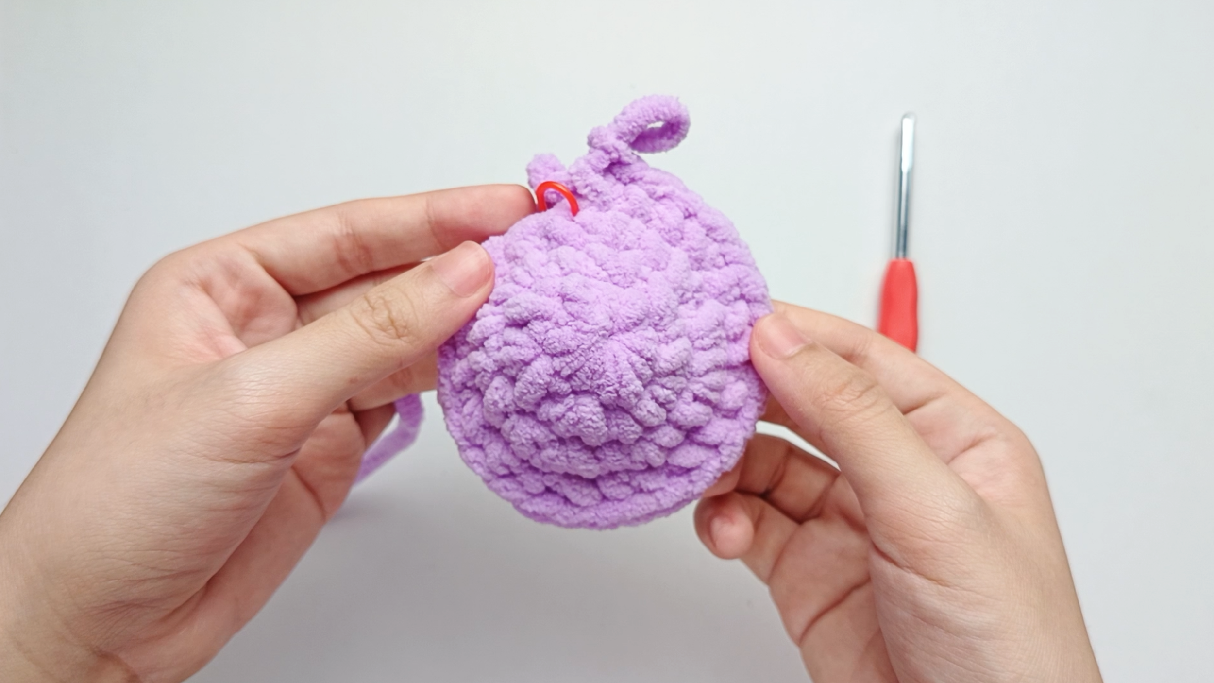 Make all your stitches: Repeat 2 single crochets (sc) and 1 increase (inc) 6 more times. There should be 28 stitches in total.