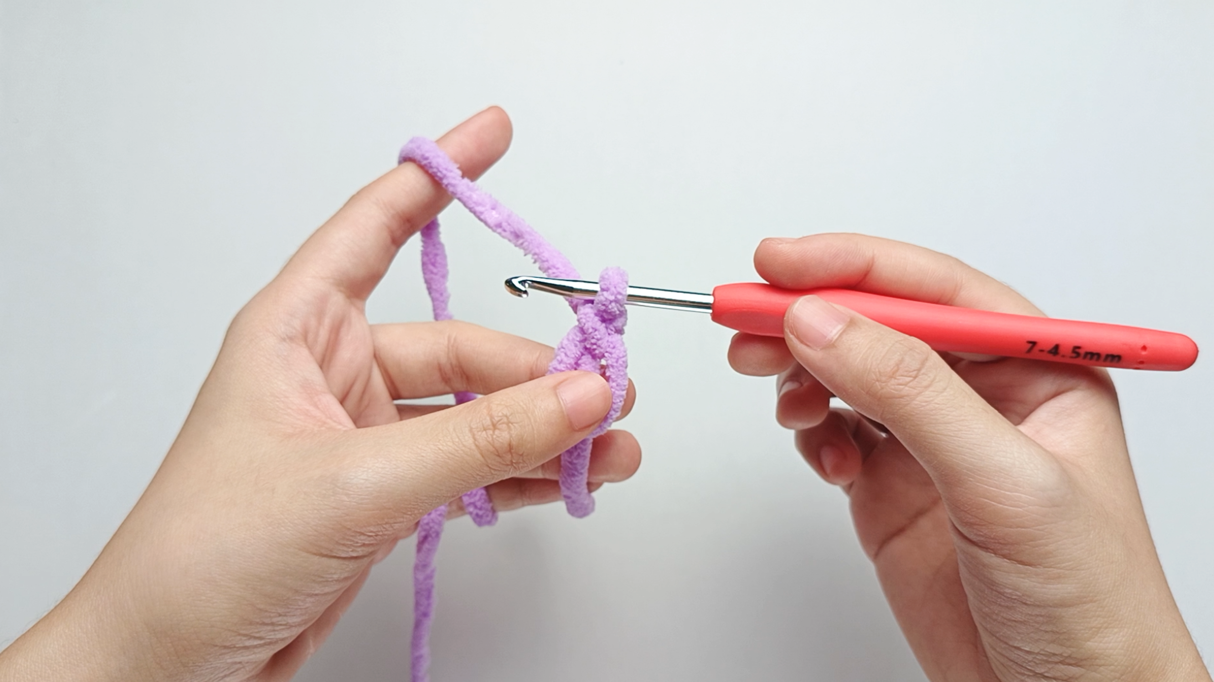 Now you'll work 7 single crochet (sc) into the center of the ring.