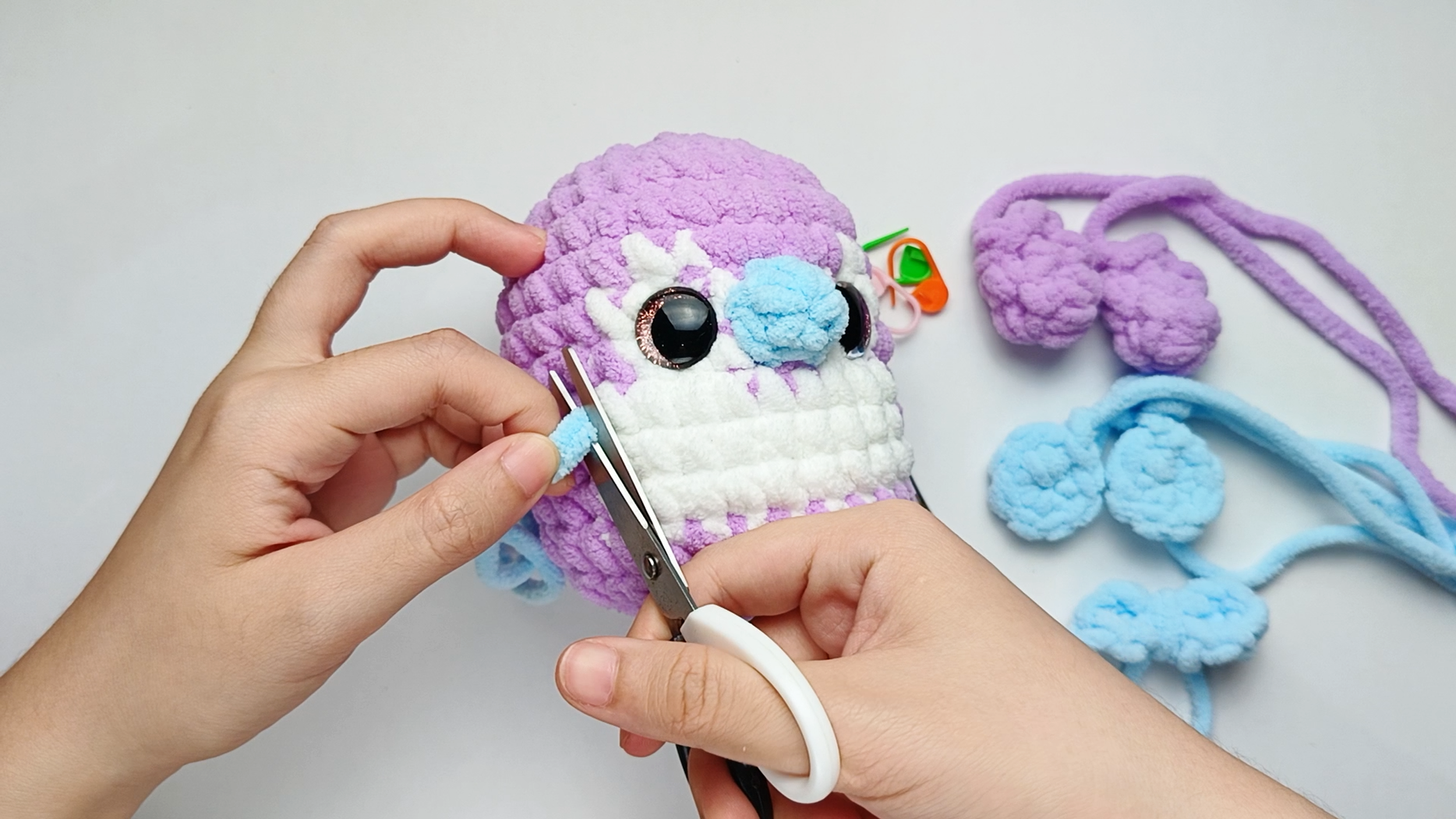 Trim the tails: Trim the tails close to the surface and gently massage the area so the end disappears inside.