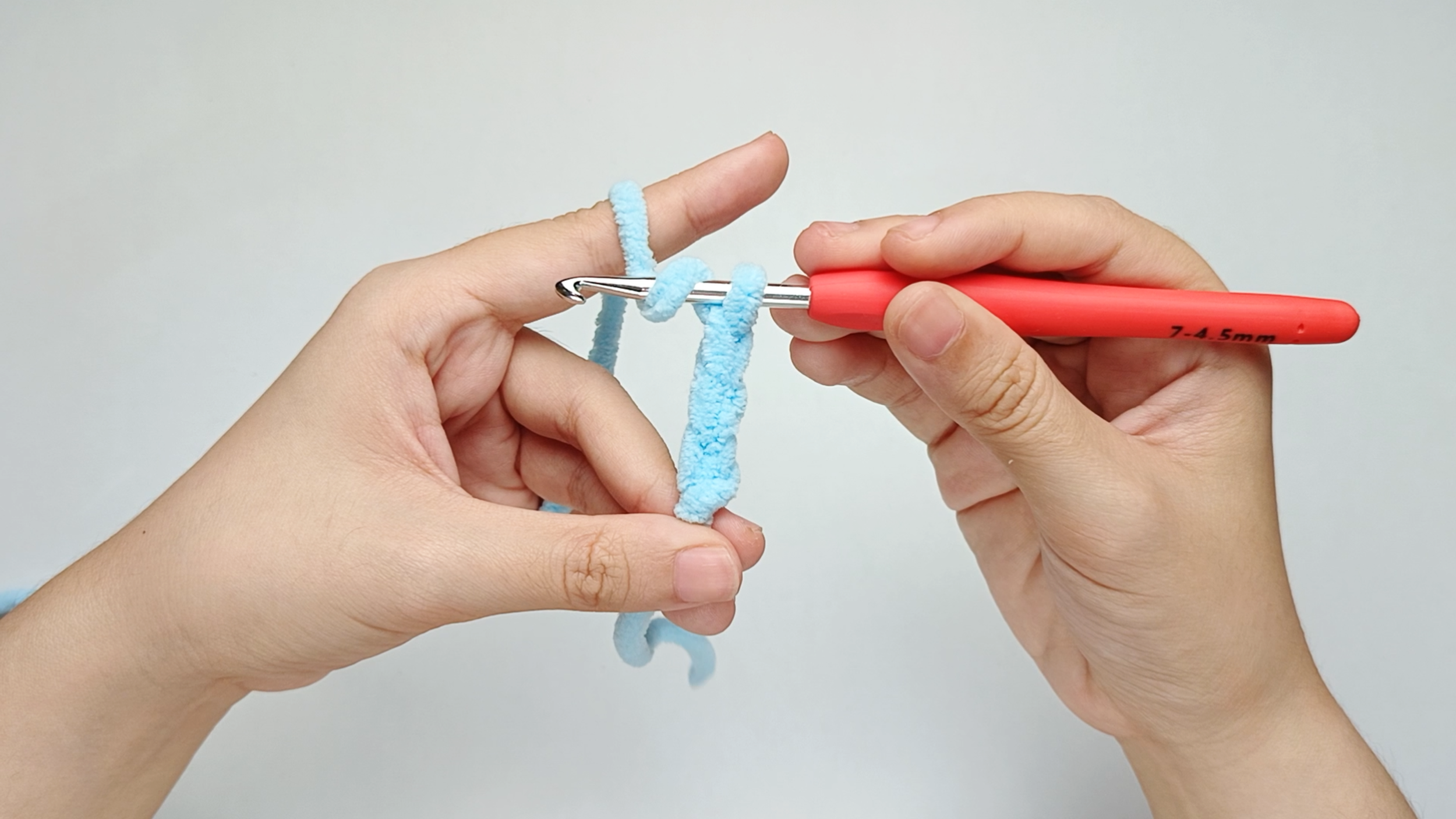 Yarn over: Start the double crochet (dc) with a yarn over.