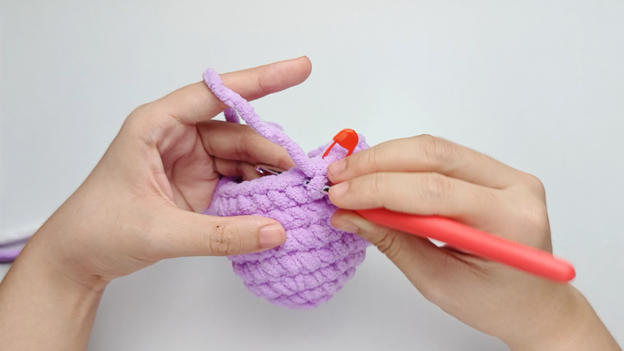 Hook back in: Insert your hook into the next stitch.