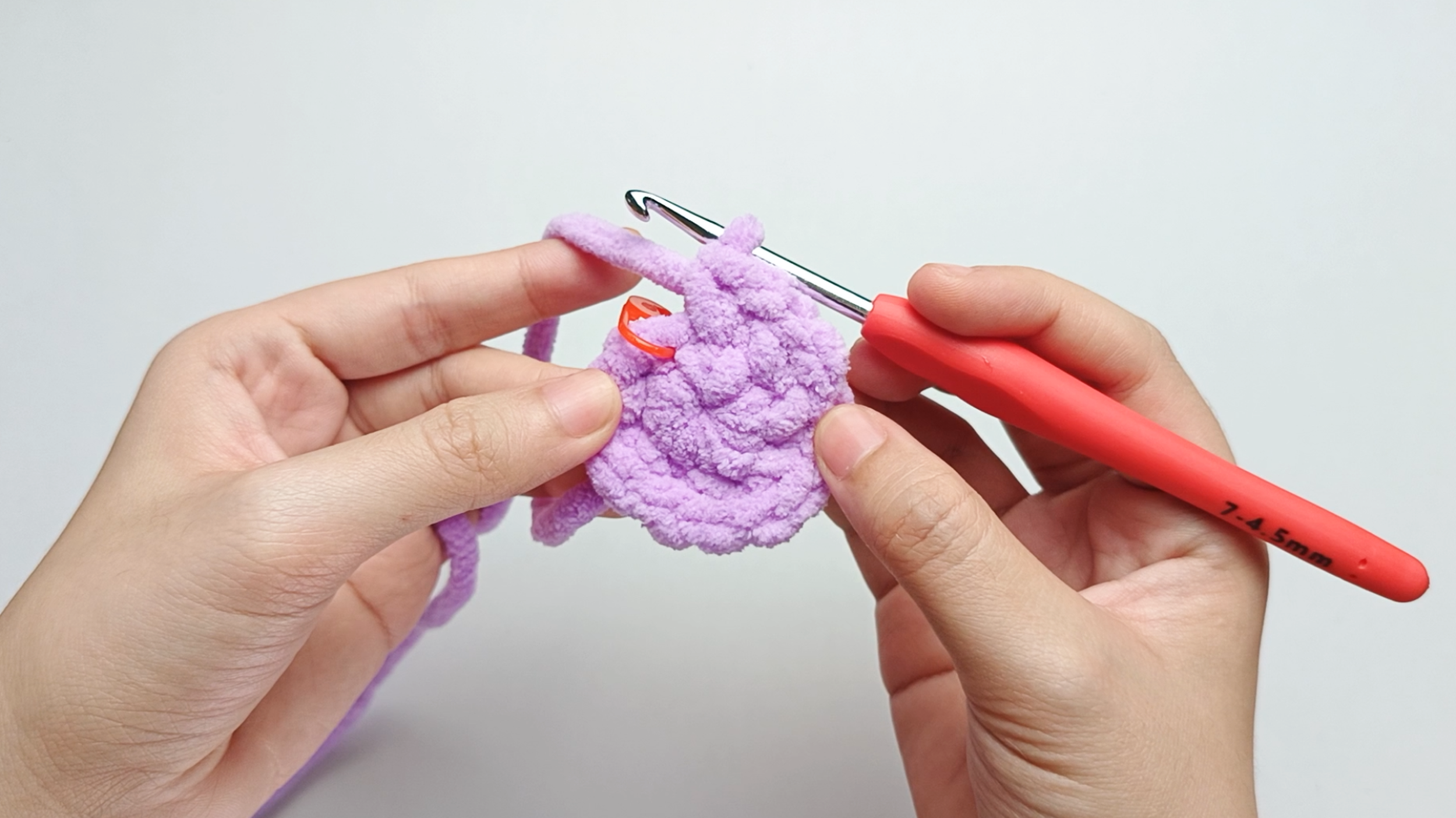 Make all your stitches: Continue crocheting in the same way to make 6 more increases (inc). There should be 14 stitches in total.