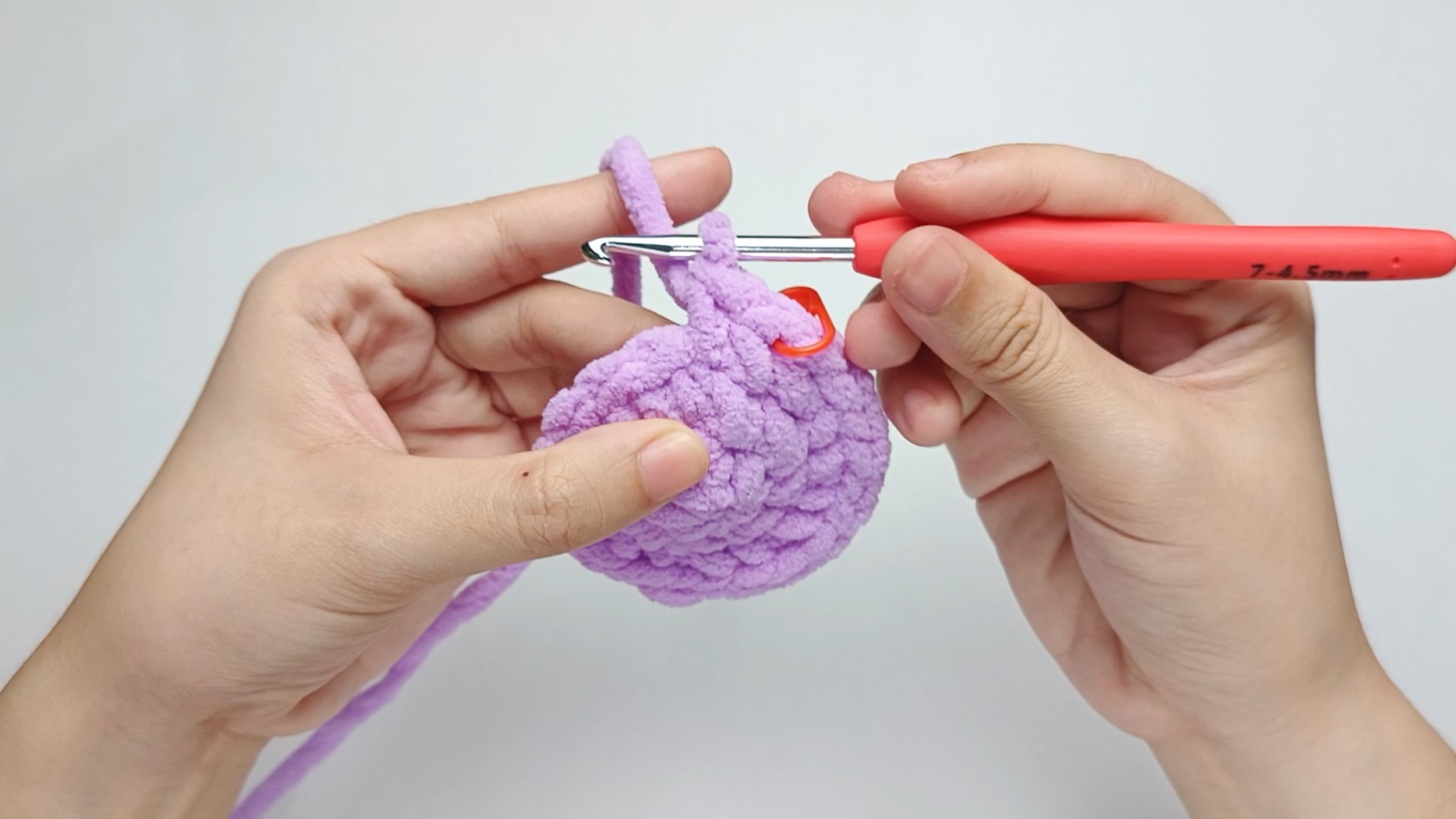 Make the second single crochet (sc): Yarn over, pull through, yarn over again, and pull through both loops.