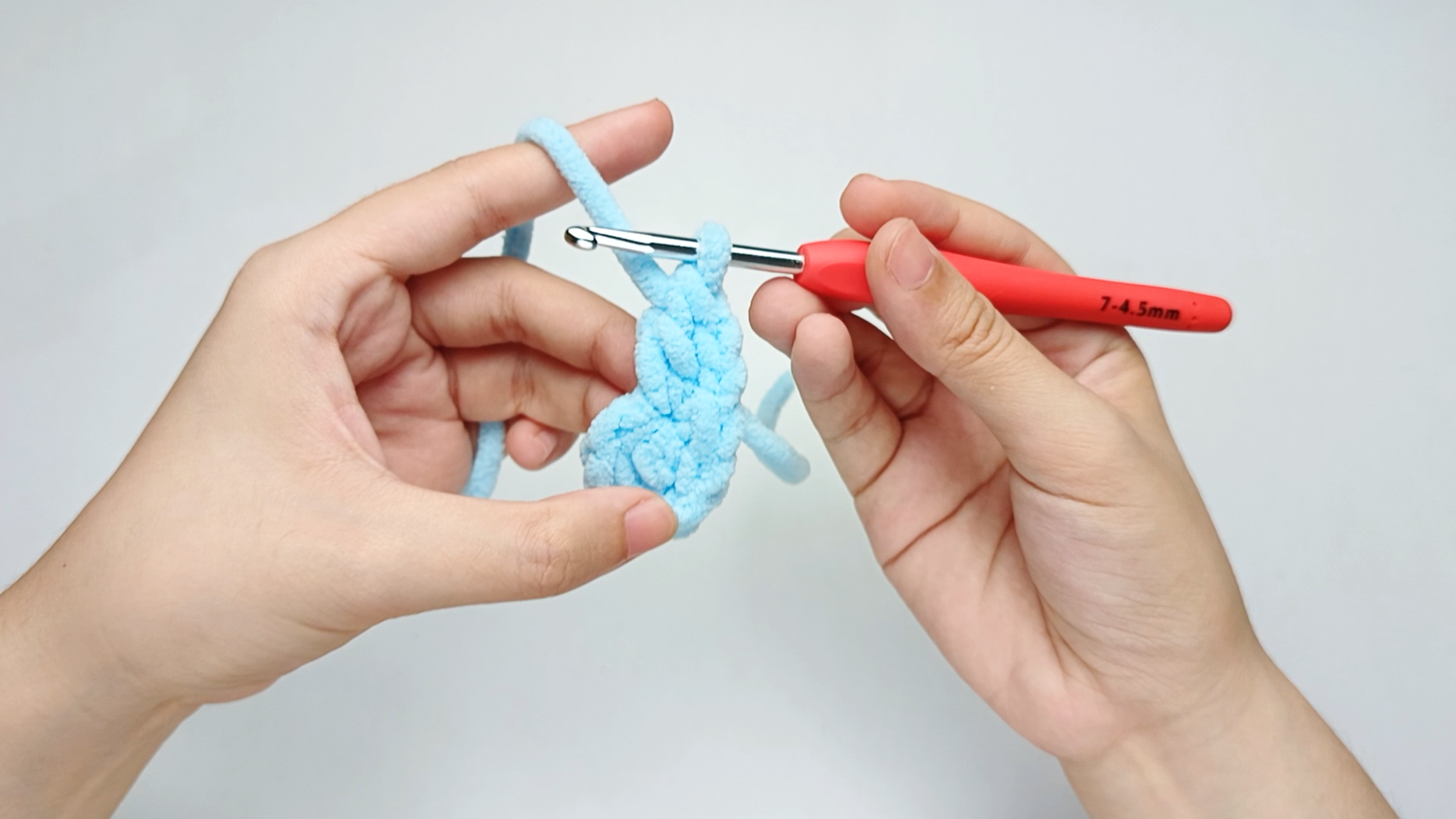 Make 1 double crochet (dc): Work 1 double crochet (dc) into the anchor chain (ch), just as you did for the first petal.