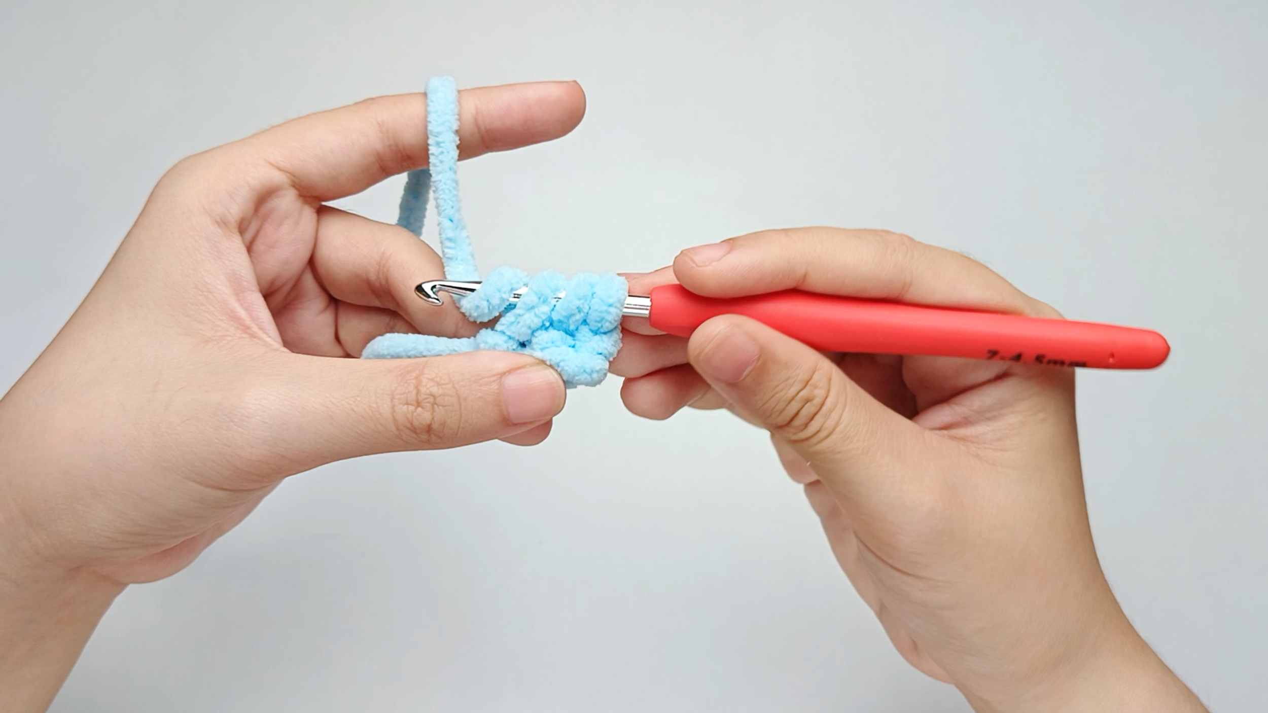 Yarn over again: Wrap the yarn over your hook one more time.