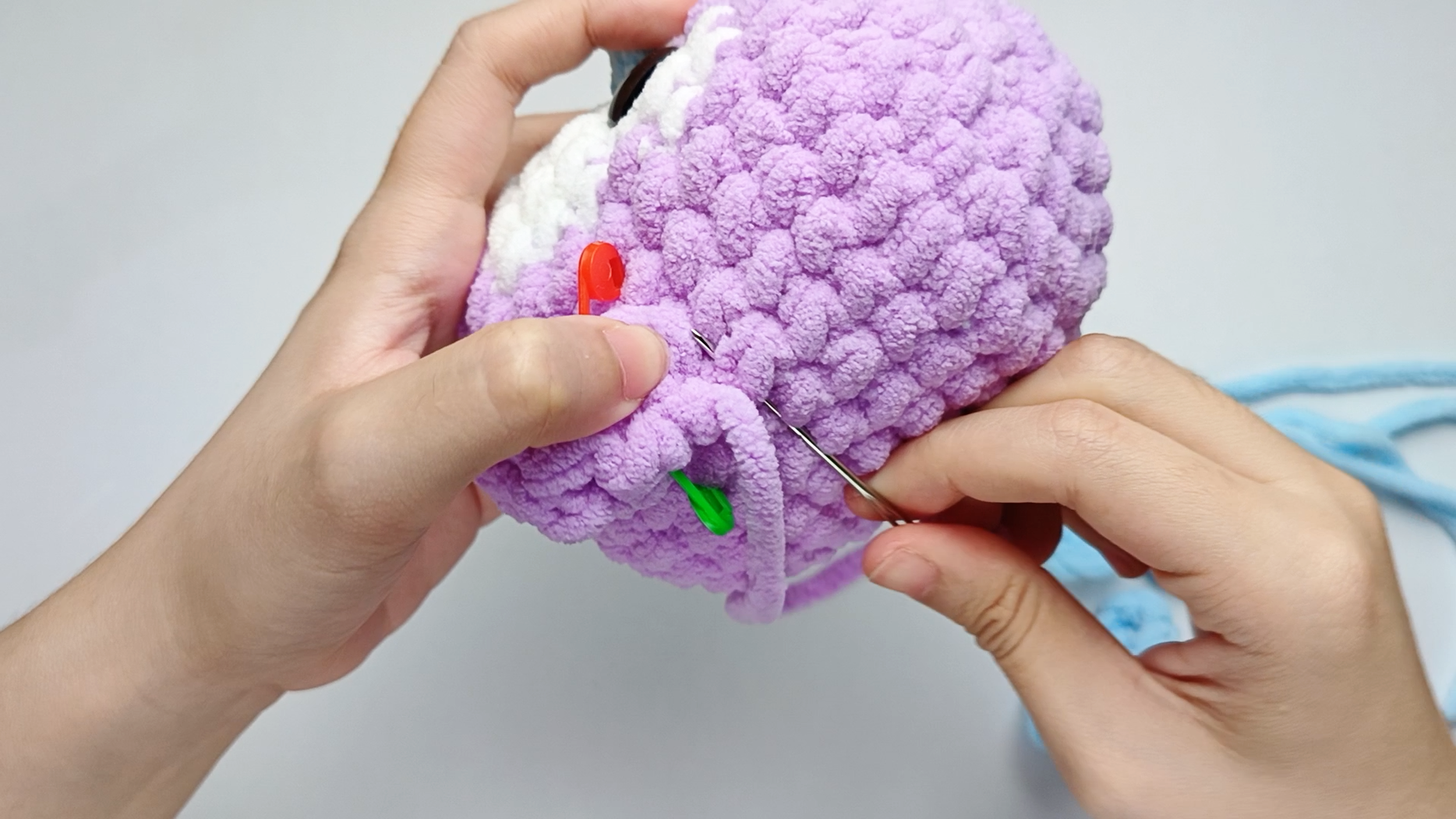 Into the Body: Insert the needle into one stitch of the Body, lining it up with the next stitch on the piece. Pull the yarn all the way through.
