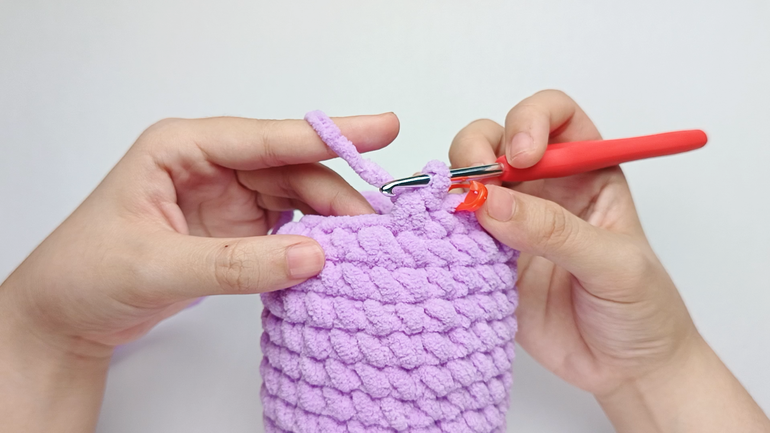 Make 1 decrease (dec): Work the next 2 stitches together to make 1 stitch, just as you did in Round 13. That is your first 1 single crochet (sc) and 1 decrease (dec).