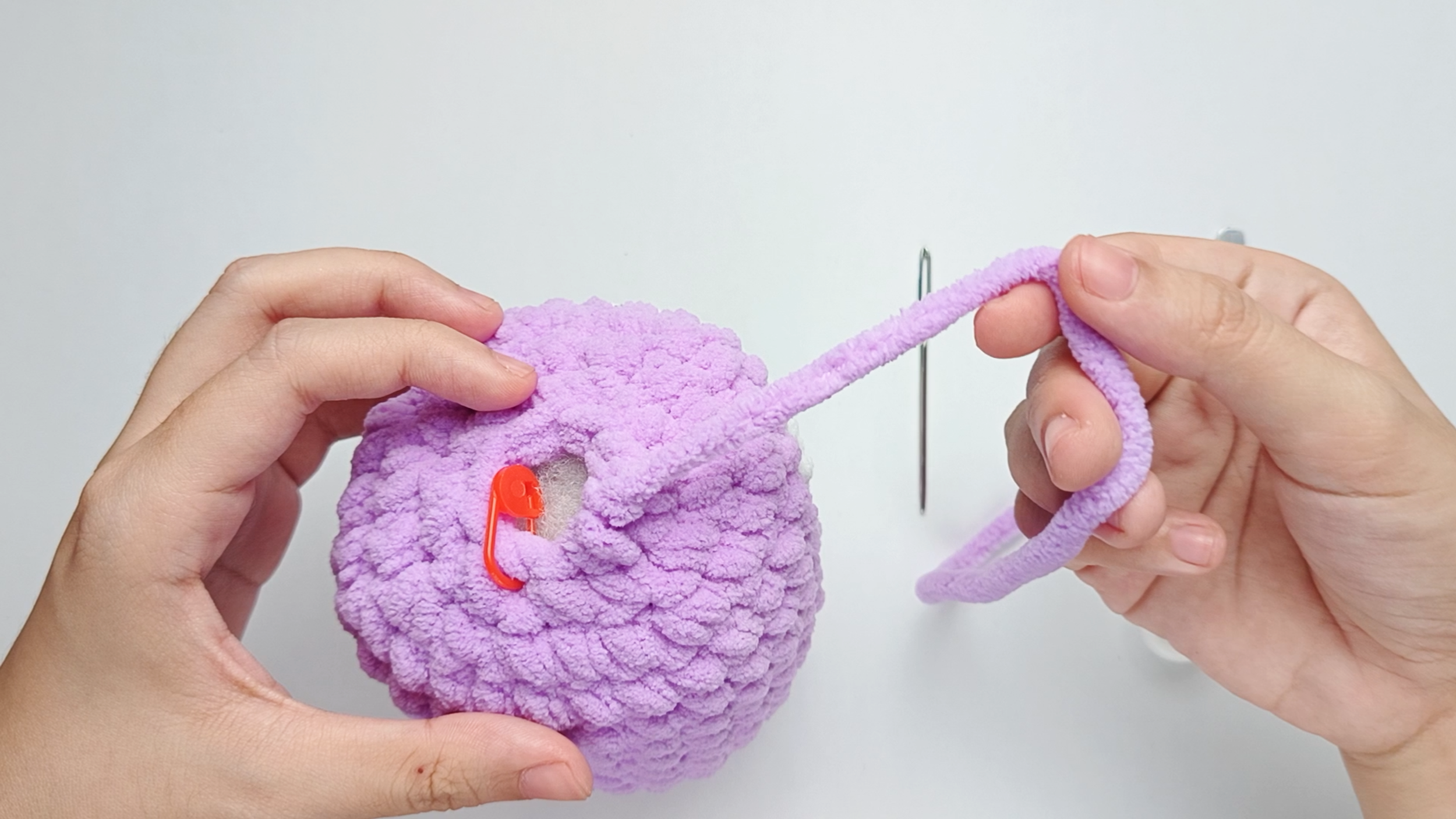 Pull it tight: Pull it all the way through that loop. Keep pulling until the tail comes all the way through and forms a small knot.