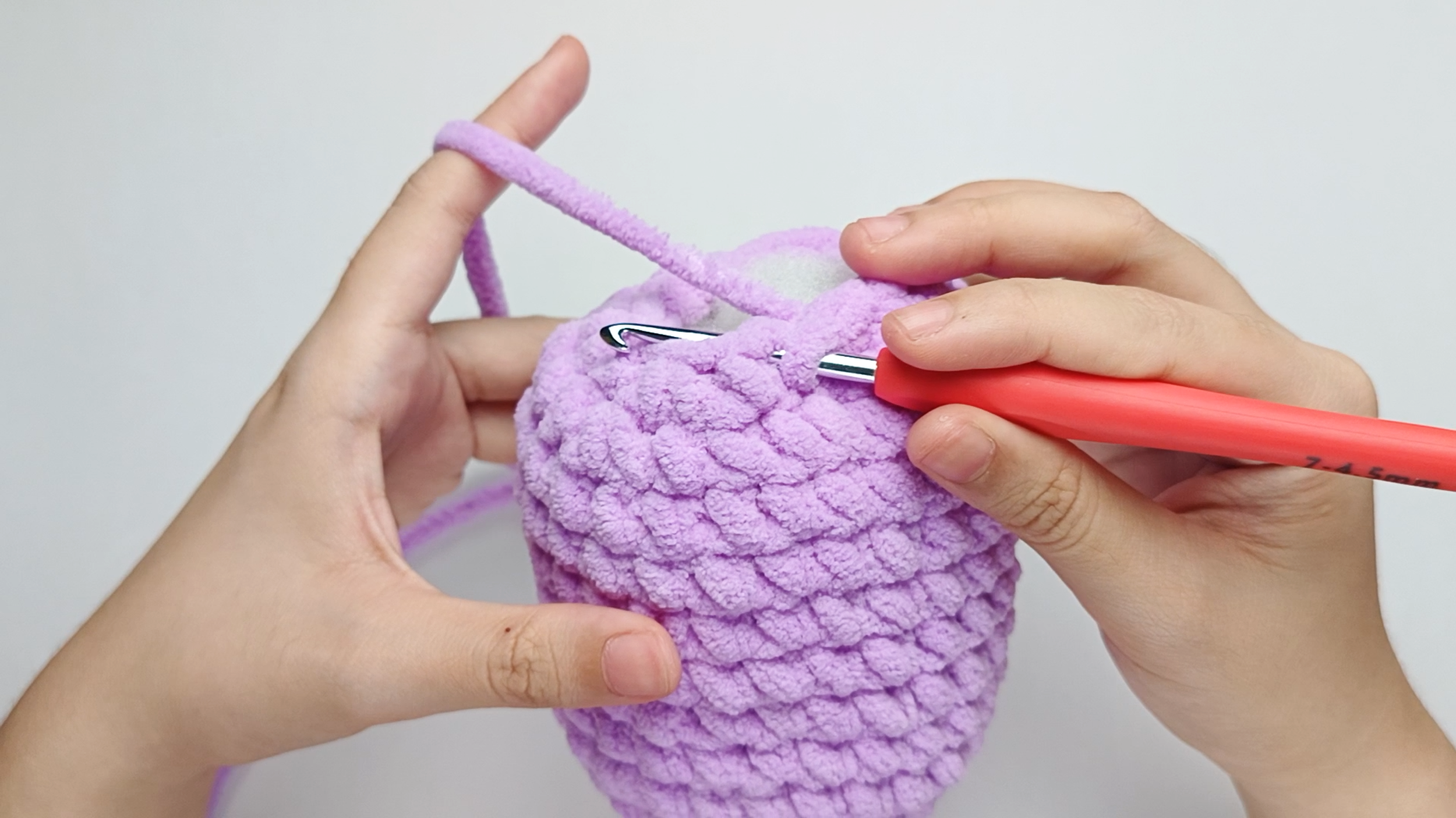 Hook back in: Insert your hook into that marked stitch to begin Round 15. Remove the stitch marker so the stitch is easier to work into.