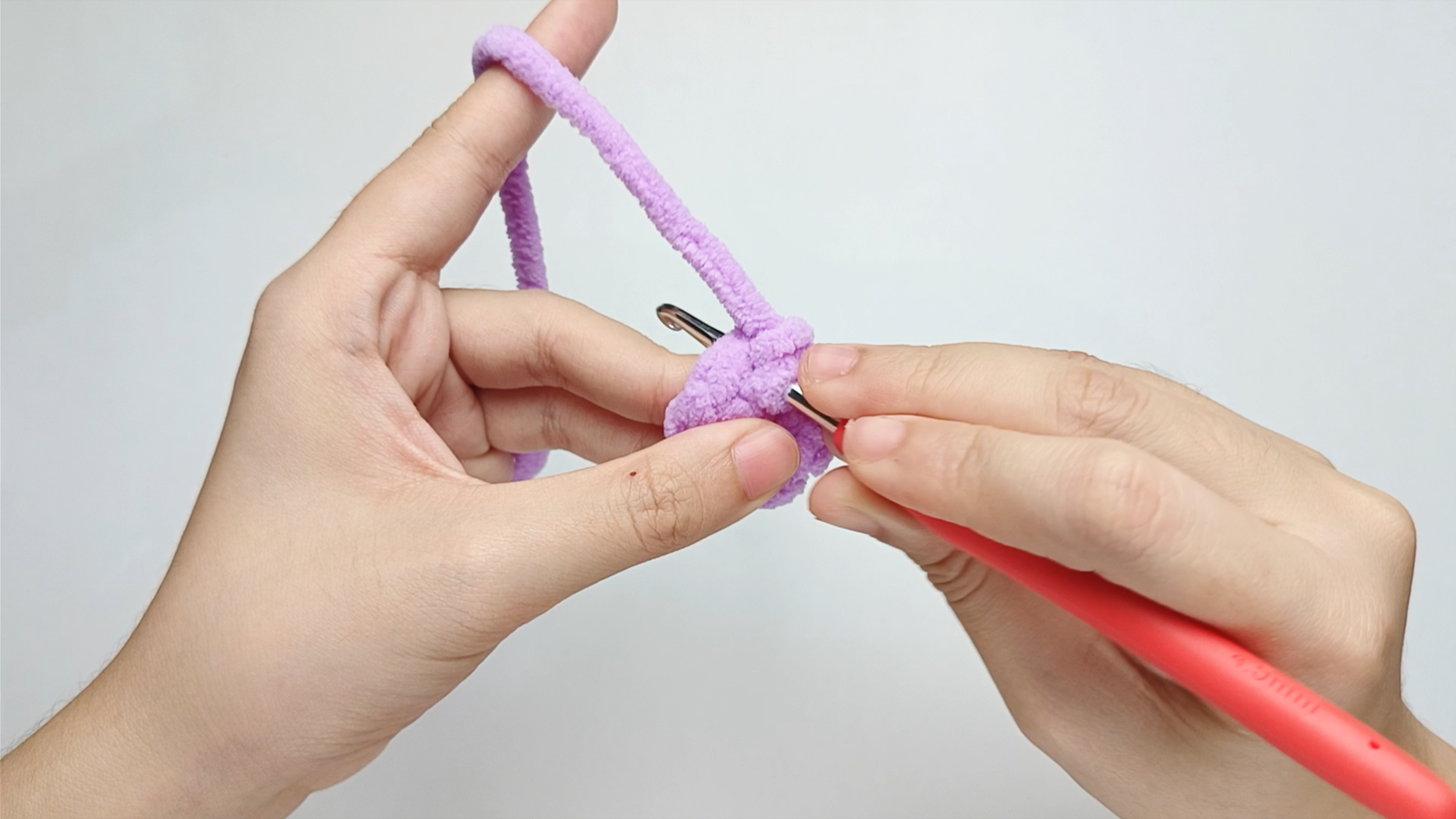 Hook back in: Insert your hook into that same hole again.