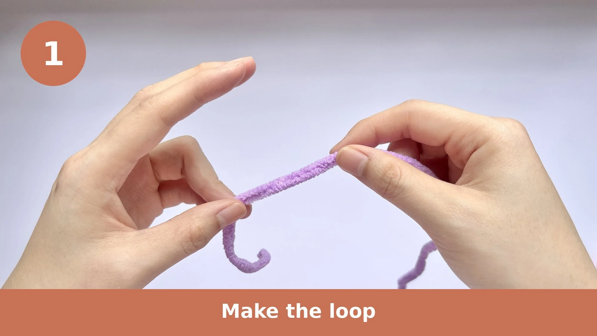 pip-the-penguin-crochet-magic-ring-01-make-the-loop.jpg