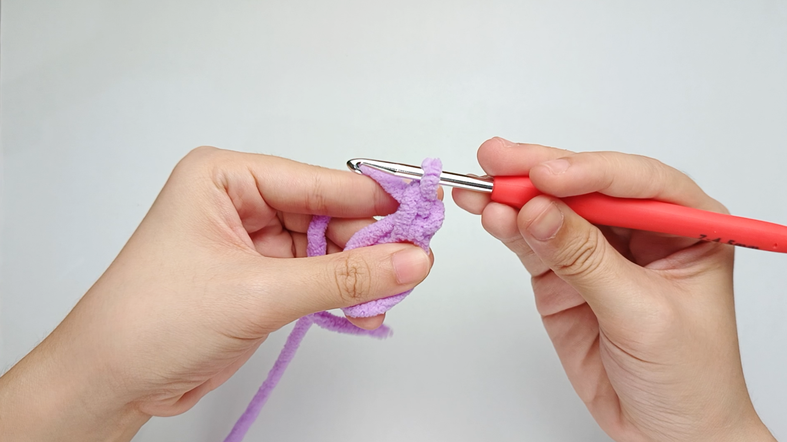 Make 1 single crochet (sc) first: Make 1 single crochet (sc) into the center of the ring.