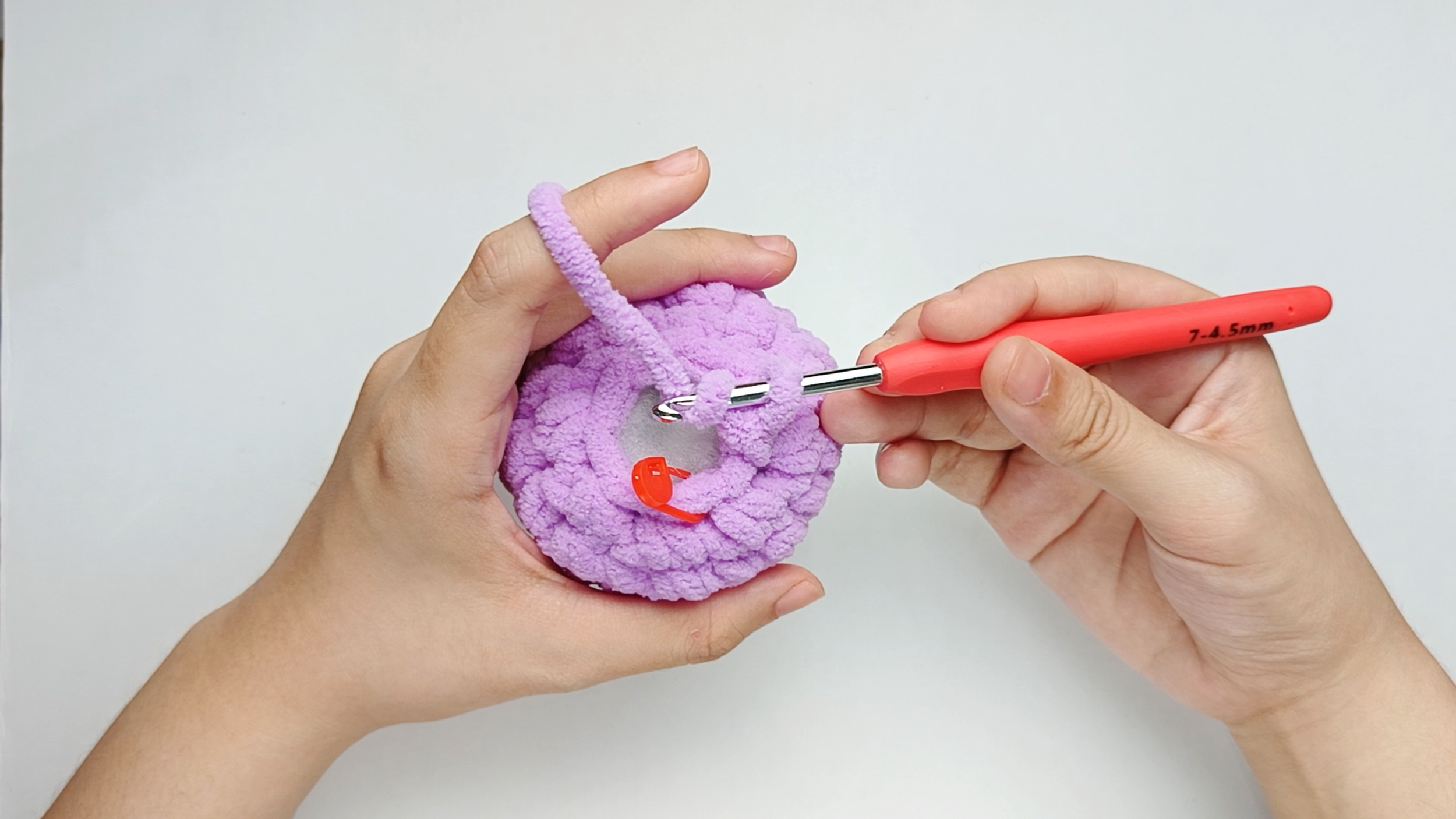 Yarn over: After your last stitch, you'll have one loop left on your hook. Yarn over with the cut tail.