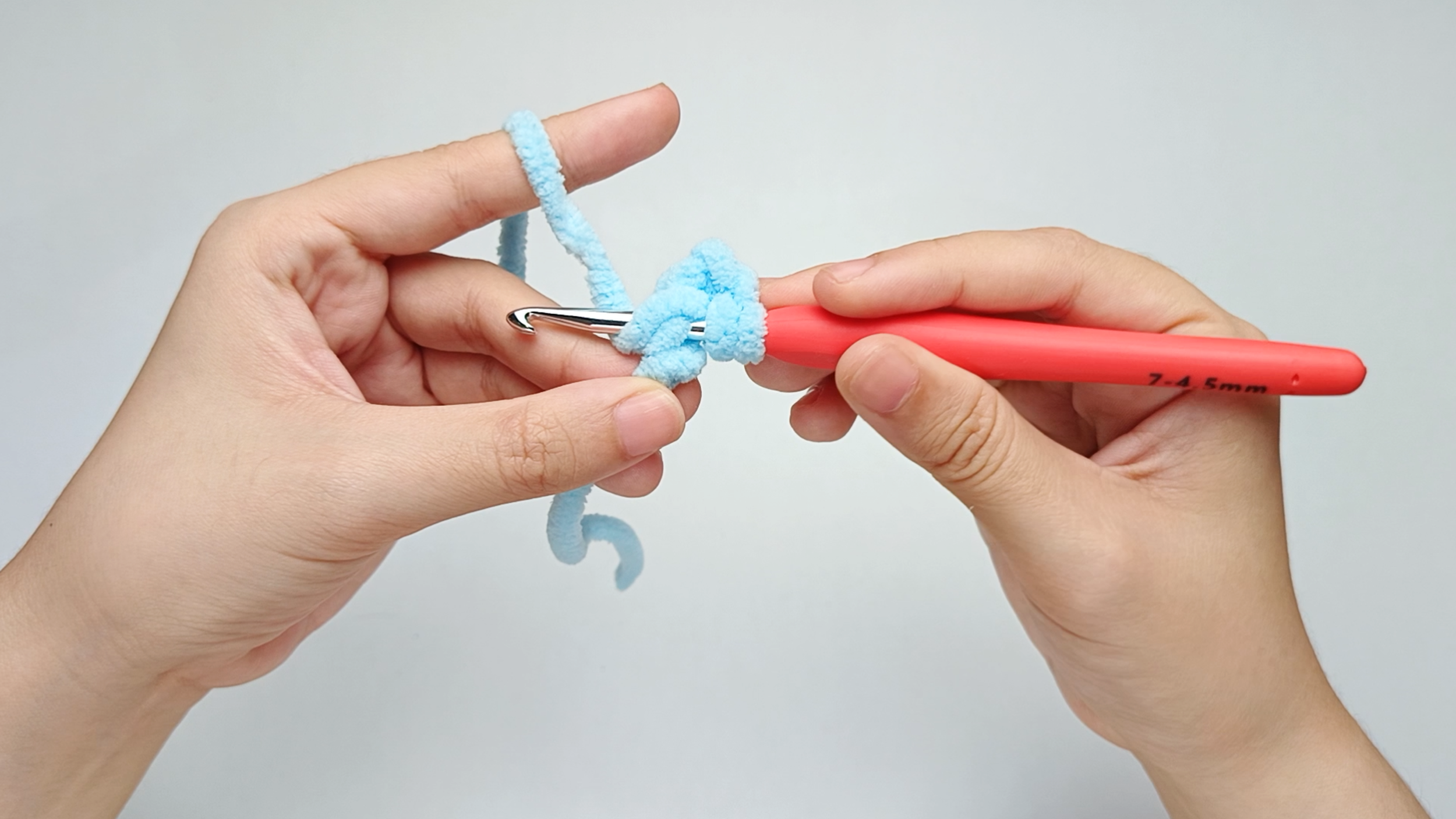Yarn over again: Wrap the yarn over your hook one more time.
