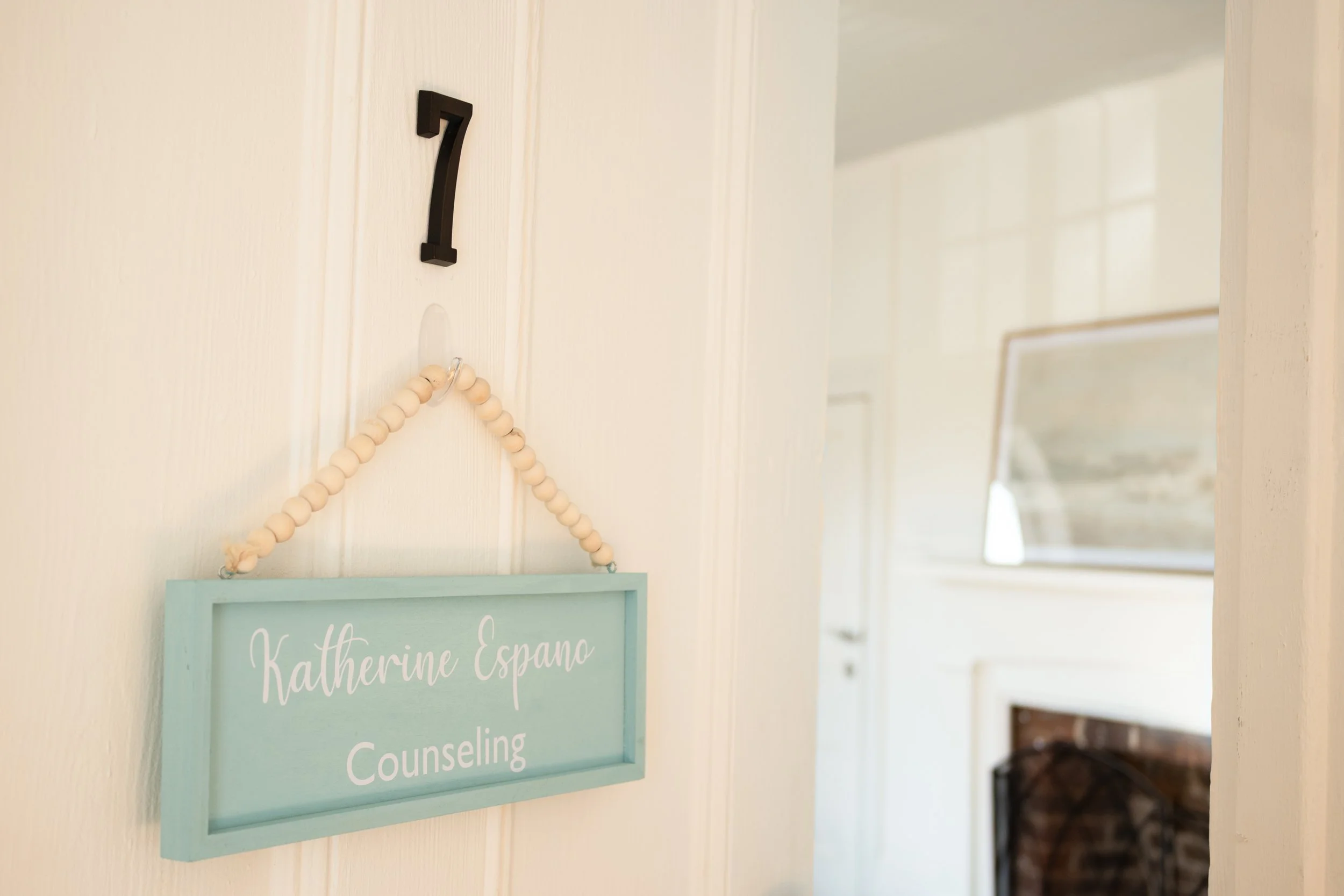 Door for Suite 7 with sign
