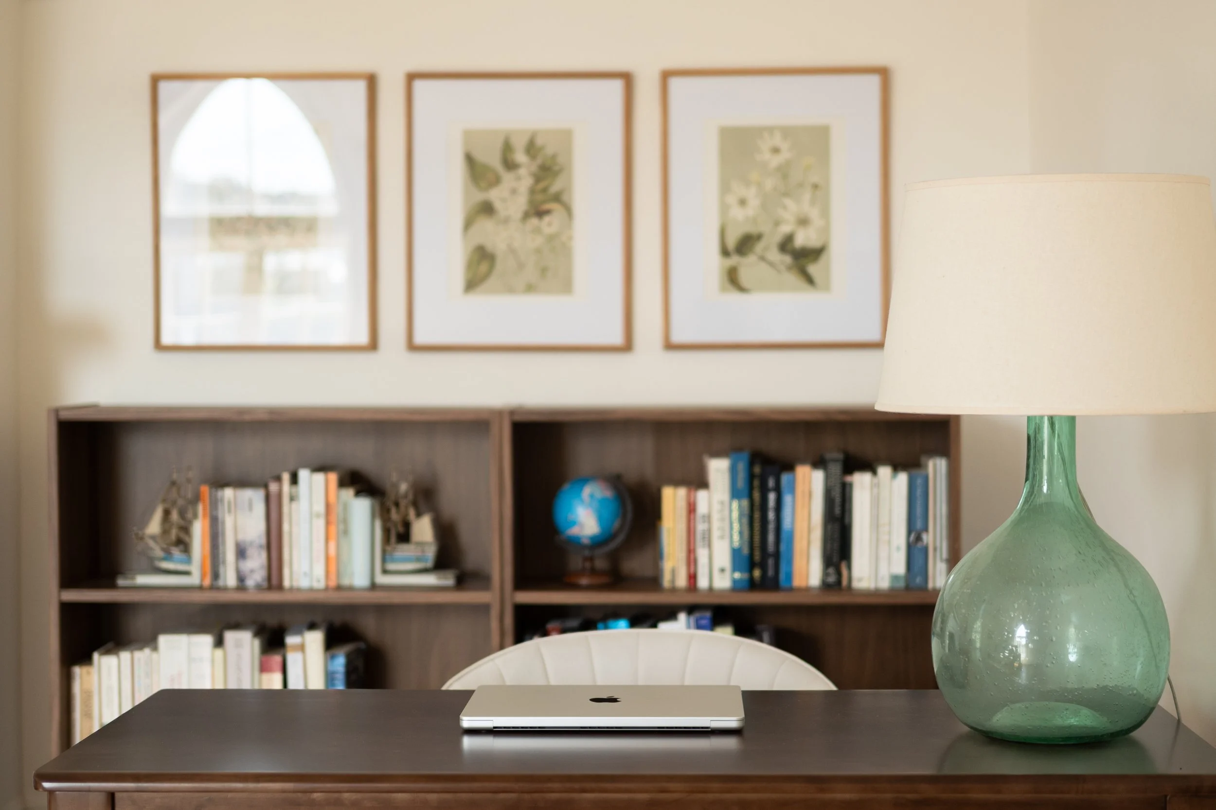 Desk and bookshelf in the counseling office
