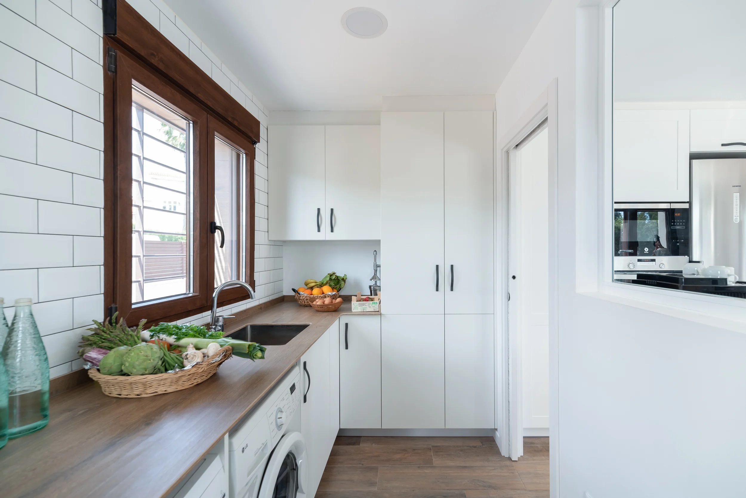 esvibar-arquitectes-villa-marisa-lavanderia-almacenaje-vivienda-obra-nueva-benicassim.webp