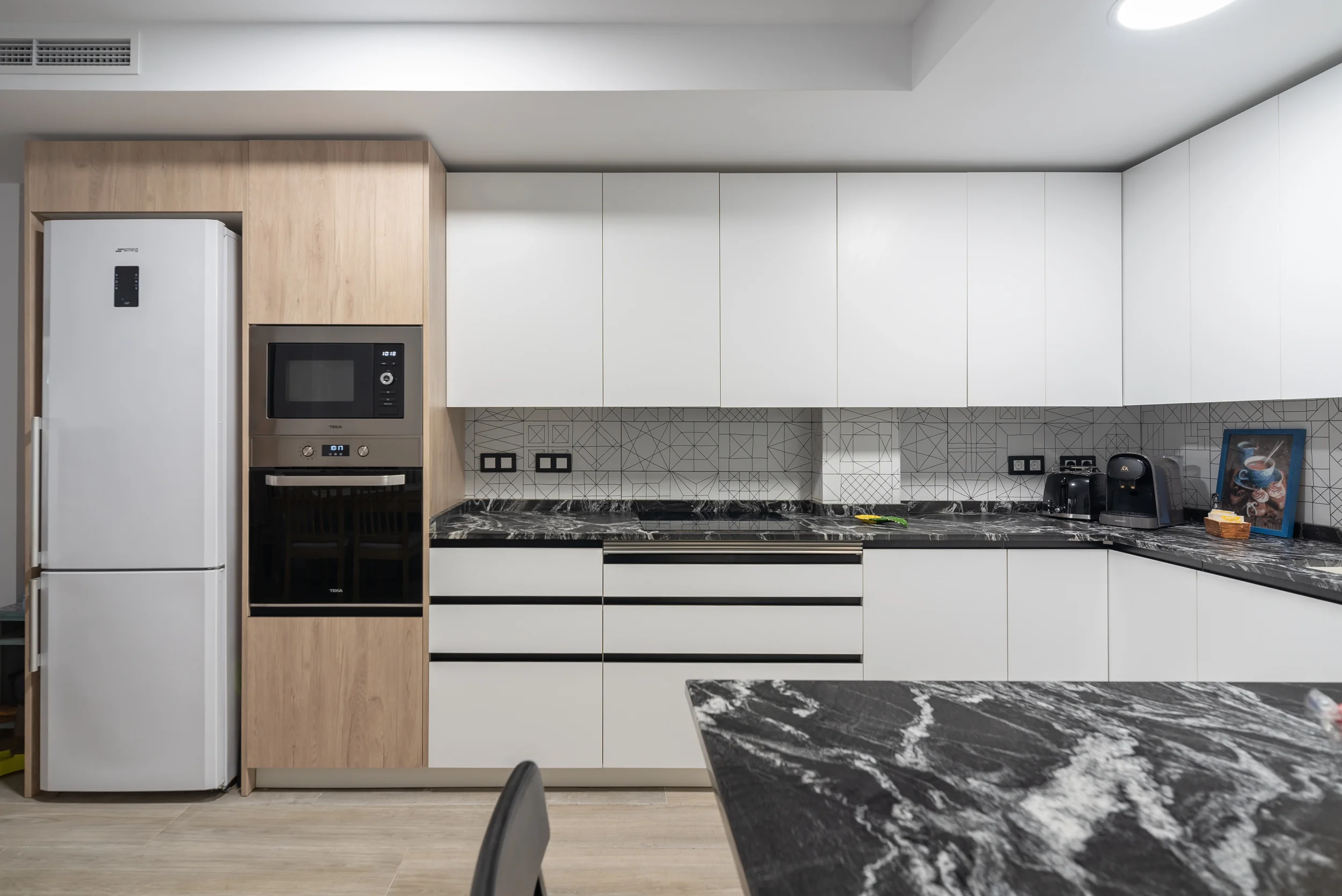 esvibar-arquitectes-sm33-cocina-atemporal-rehabilitacion-vivienda-vilareal-castellon-03.webp