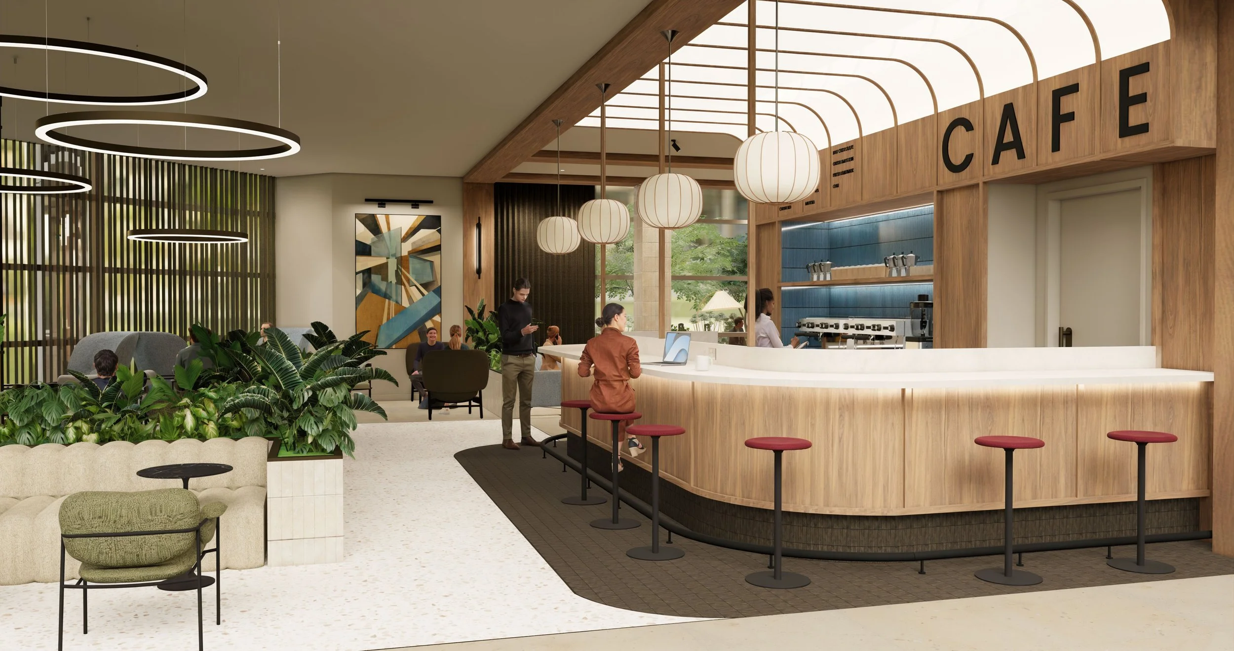 Modern cafe interior with seating, plants, a reception area, and a barista serving coffee behind the counter.