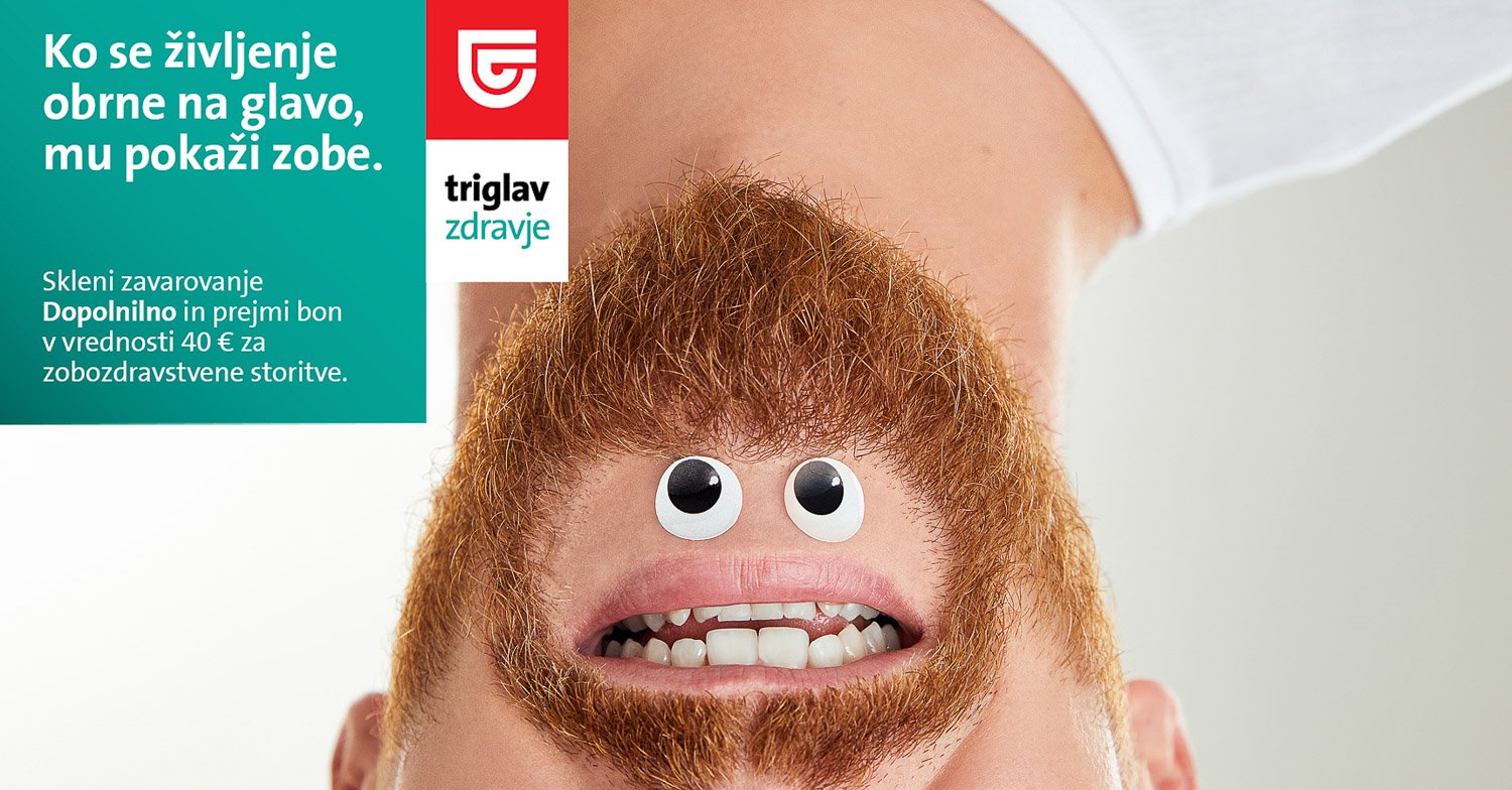 A person with a ginger beard and hair has a facial expression edited with cartoonish eyes and a mouth, resembling a monster mask. 