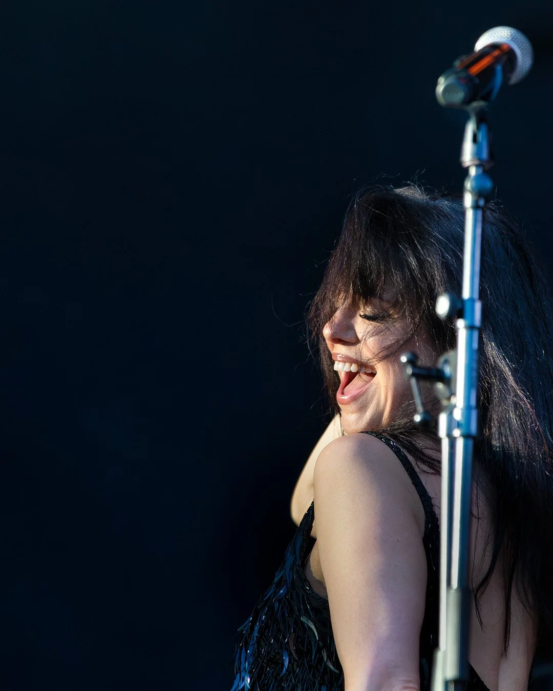 Imelda May smiling on stage during her Pori Jazz 2026 performance in Finland.