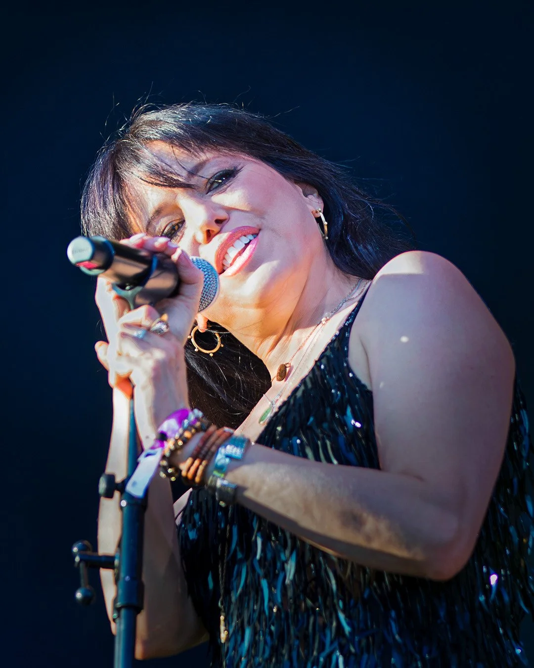Close-up of Imelda May singing into a microphone at Pori Jazz 2026 in Finland
