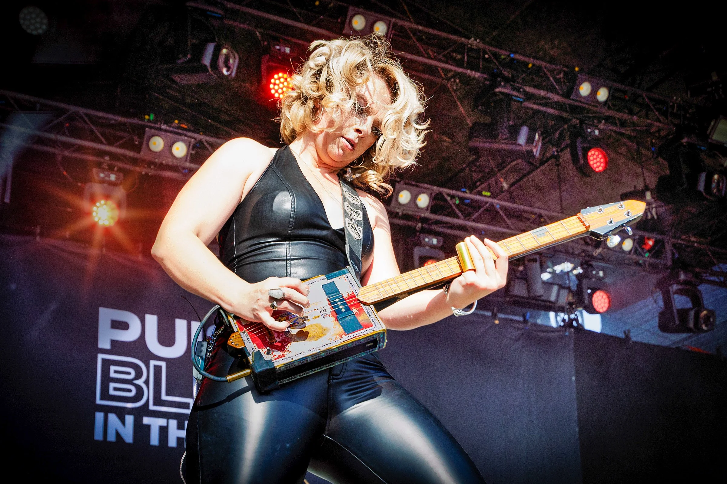Samantha Fish playing a cicar box guitar during her live performance at Puistoblues Festival, 2026.