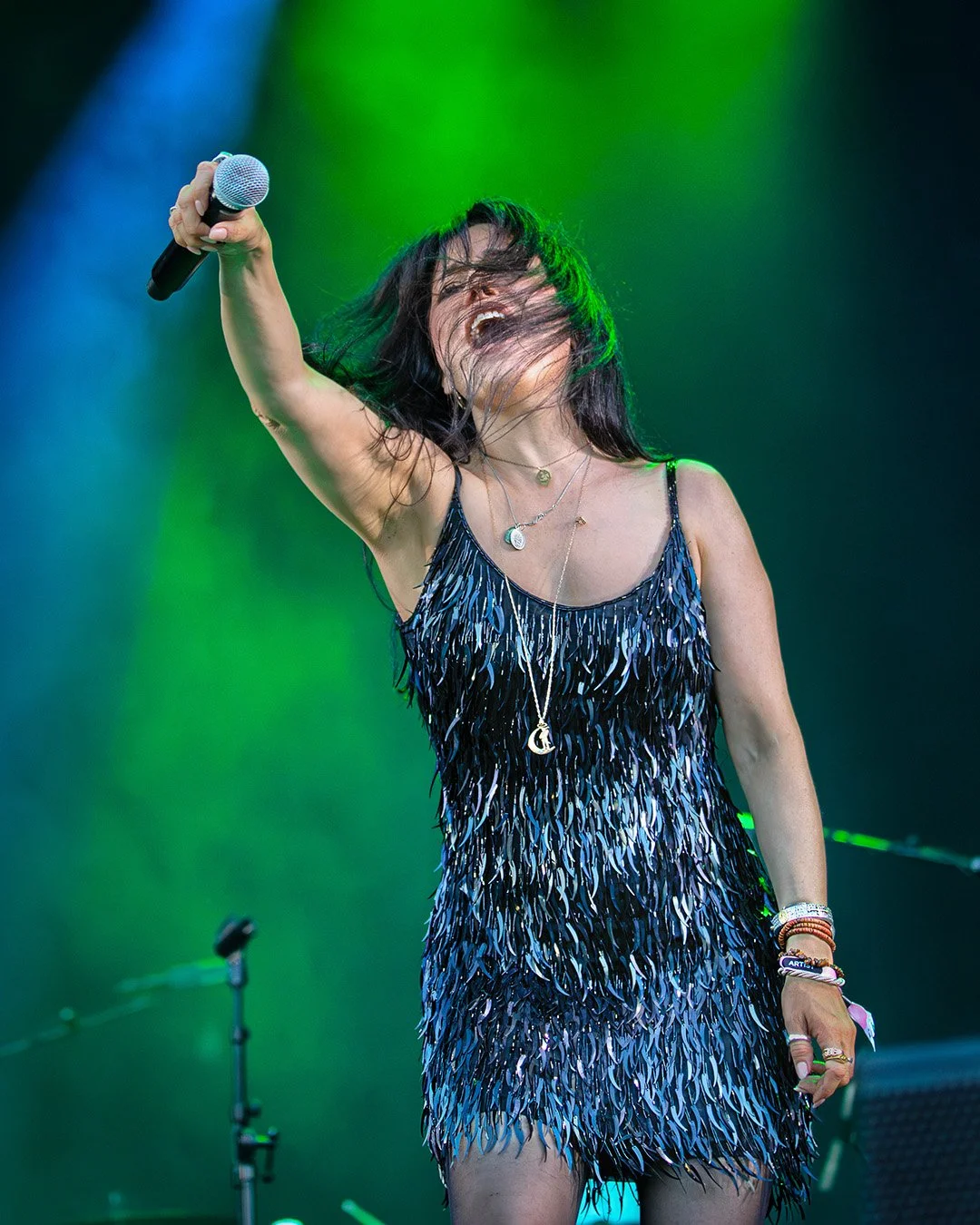 Imelda May singing under green stage lights at Pori Jazz 2026 in Finland.
