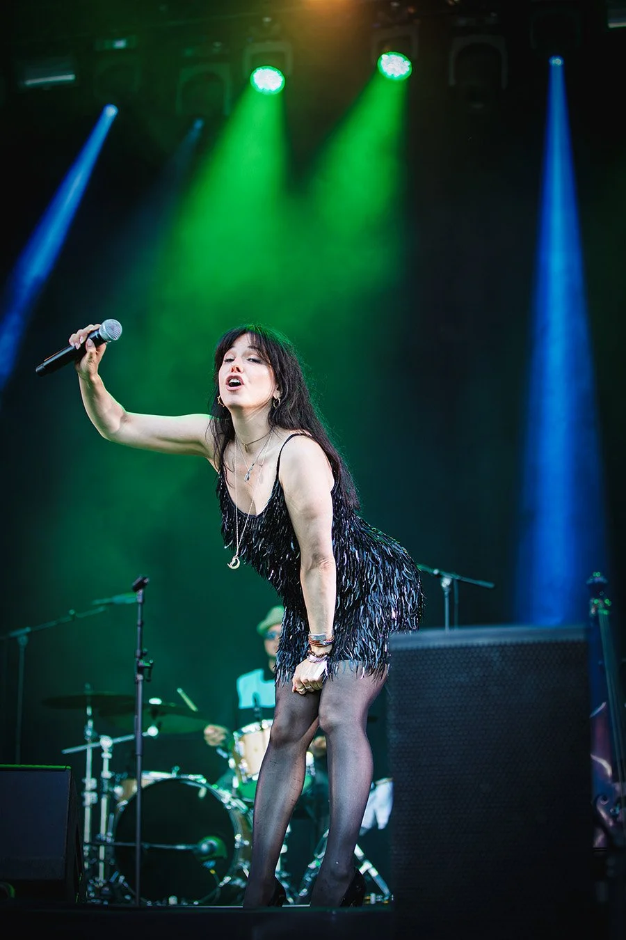 Imelda May singing under green concert lighting at Pori Jazz 2026 in Finland.