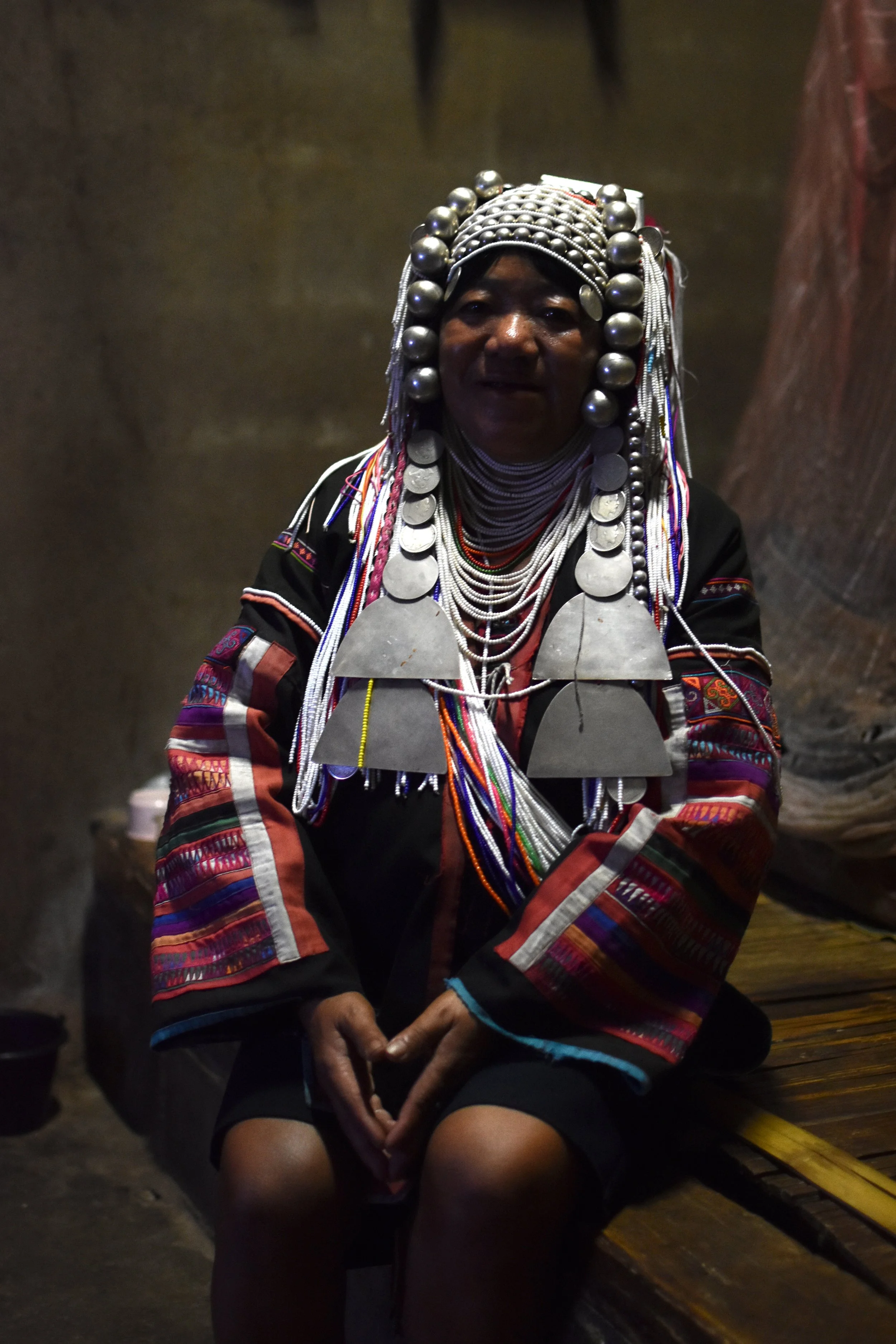 A woman from the Akha ethnic group in her home in northern Thailand. Self-published, April 2024.