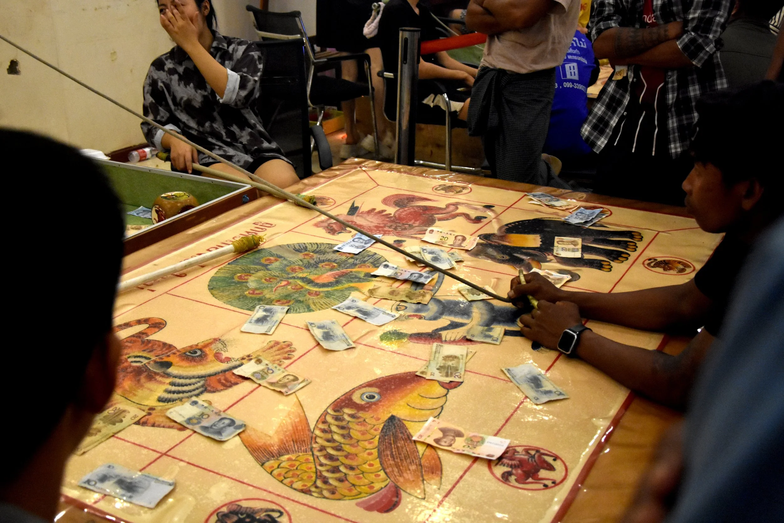 A gambling den for Burmese workers in the Golden Triangle SEZ in Laos. Nikkei Asia, Sept 2023.