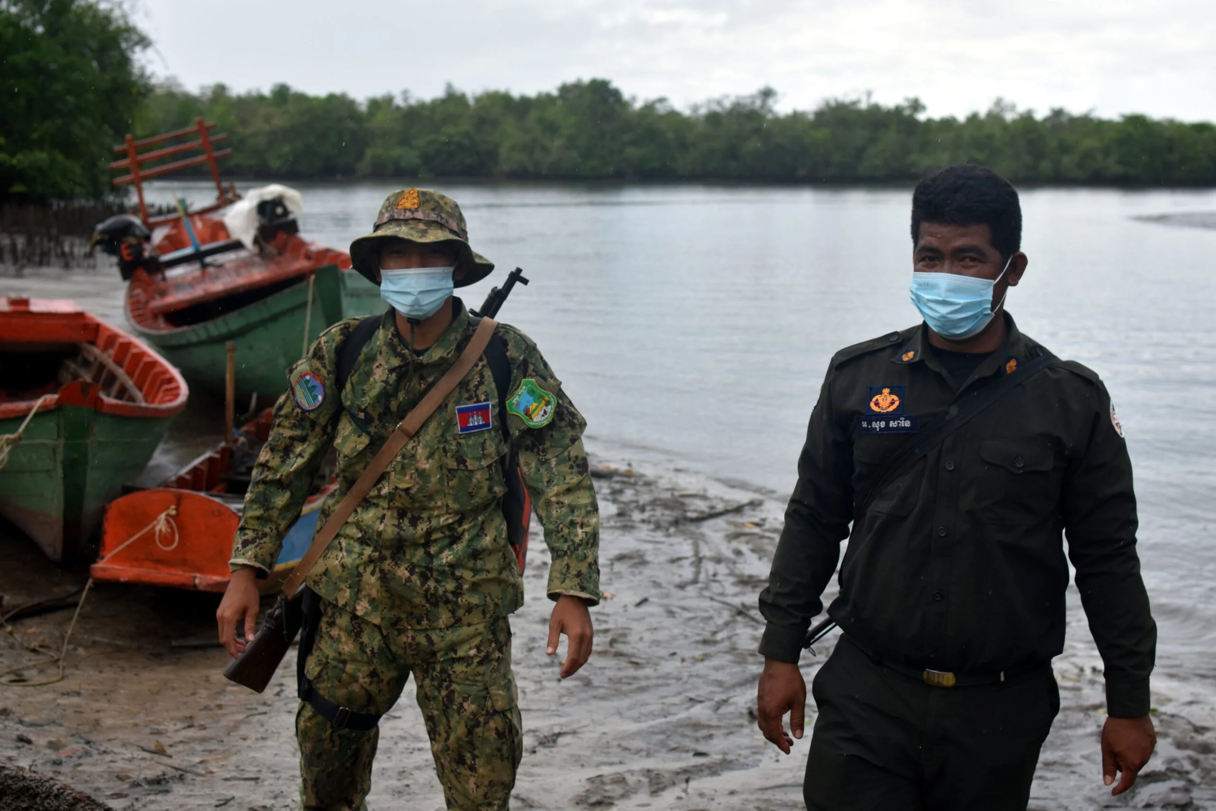 Forest rangers and gendarmes search for illegal loggers in southern Cambodia. Southeast Asia Globe, June 2022. 