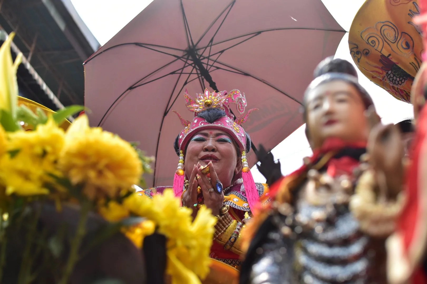 A woman at a religious festival in Phnom Penh, Cambodia. The Phnom Penh Post, April 2019. 