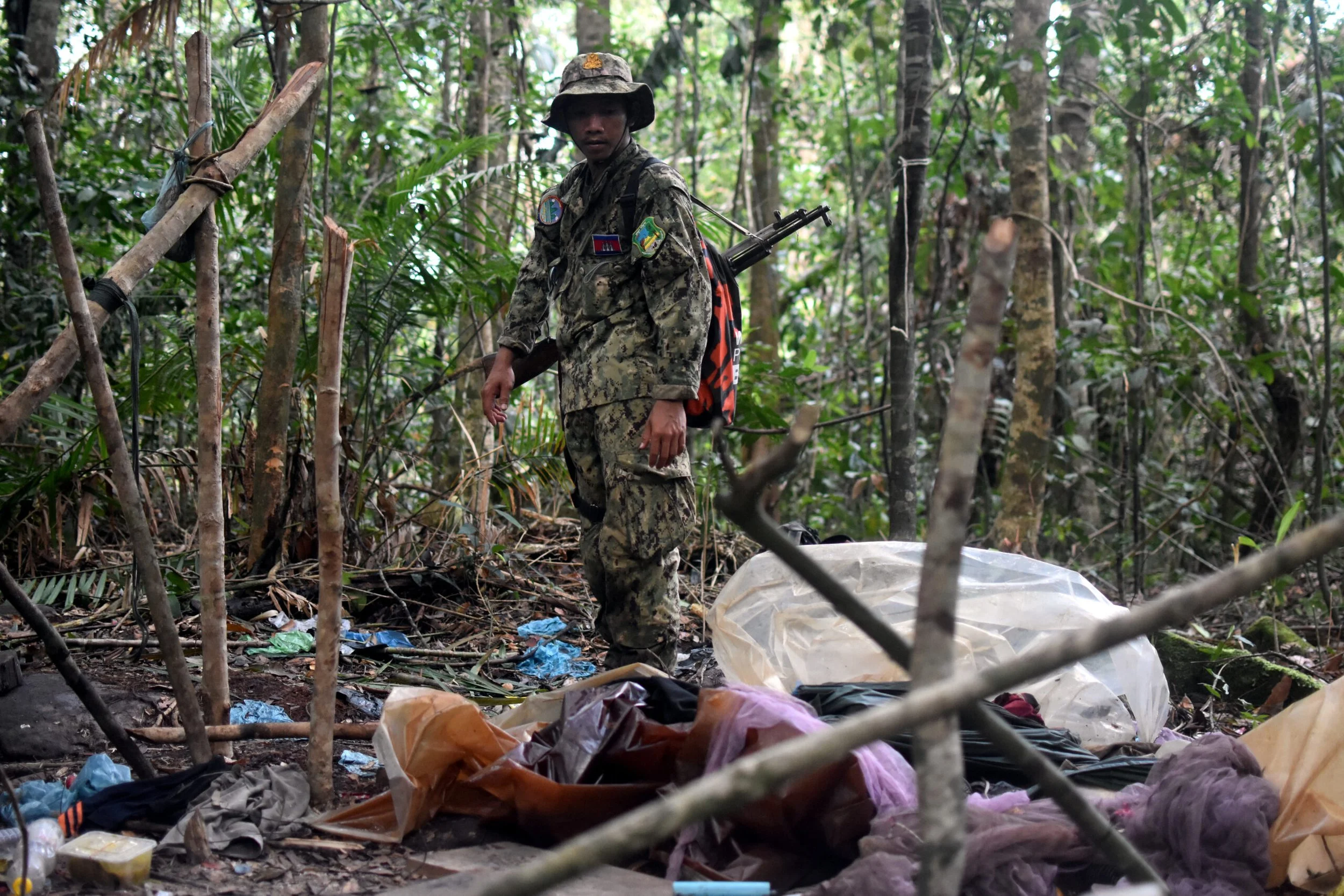 A forest ranger searches for illegal loggers in southern Cambodia. Southeast Asia Globe, June 2022. 