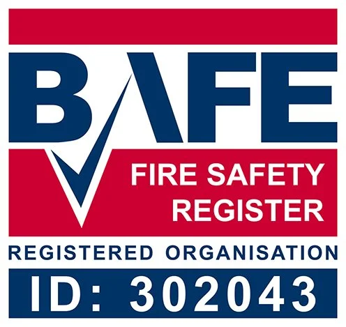 A sign with a red, white, and dark blue colour scheme that reads 'FIRE SAFETY REGISTER'