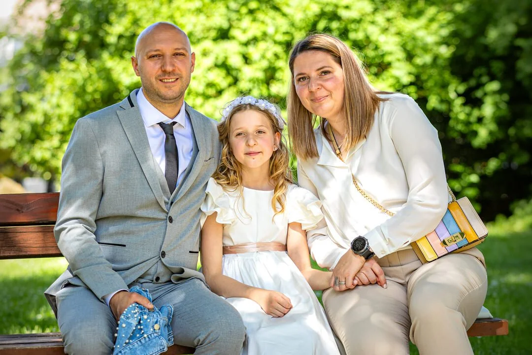 First Holy Communion family portrait at Župa Kraljice Svete Krunice, Zagreb