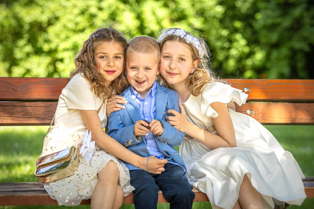 First Holy Communion family portrait at Župa Kraljice Svete Krunice, Zagreb