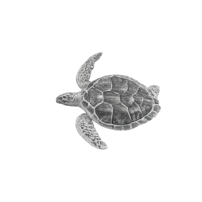 A black and white illustration of a sea turtle.